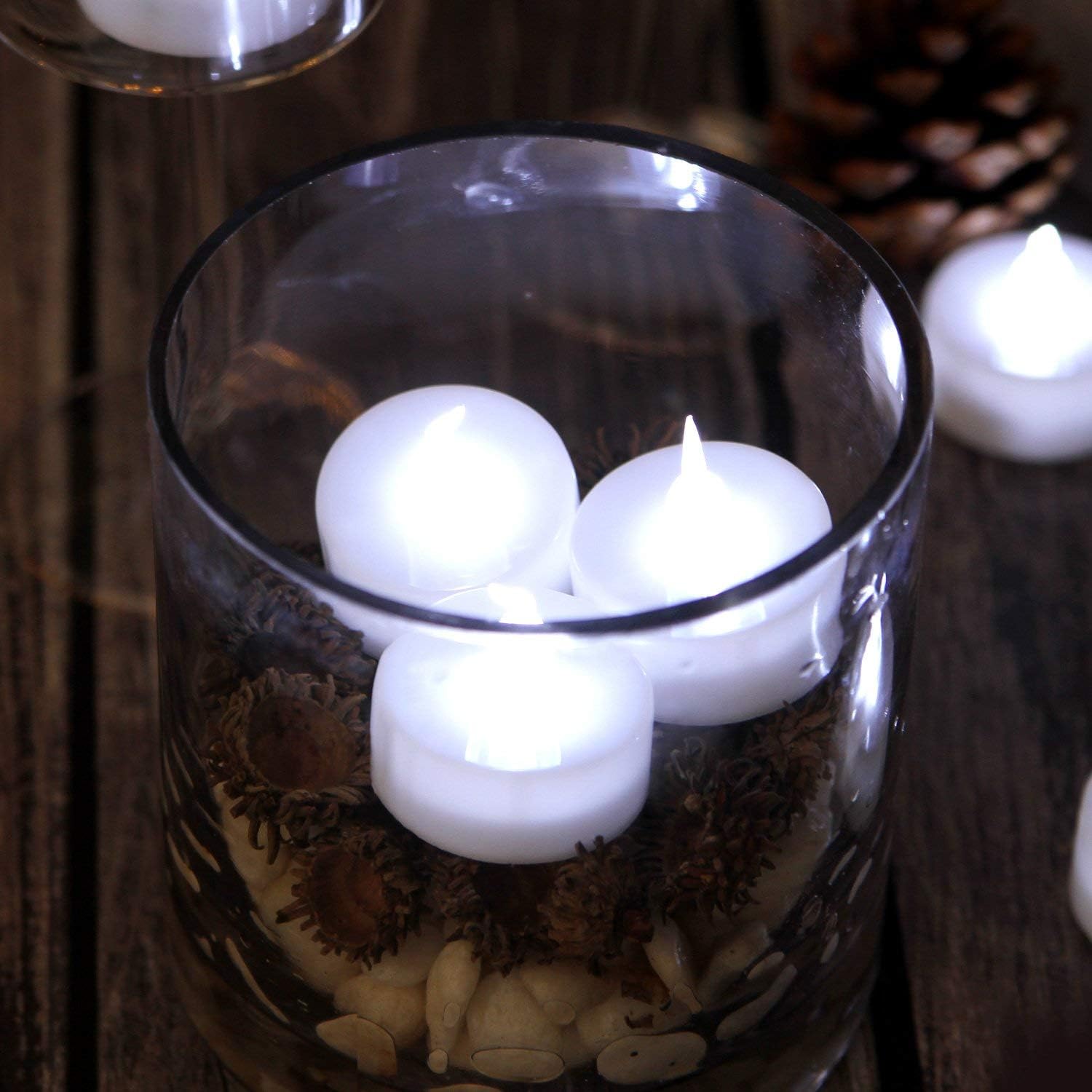AGPtEK Velas de té, paquete de 24 velas LED sin llama, funciona con pilas, velas sin parpadeo, de larga duración para boda, vacaciones, fiesta,