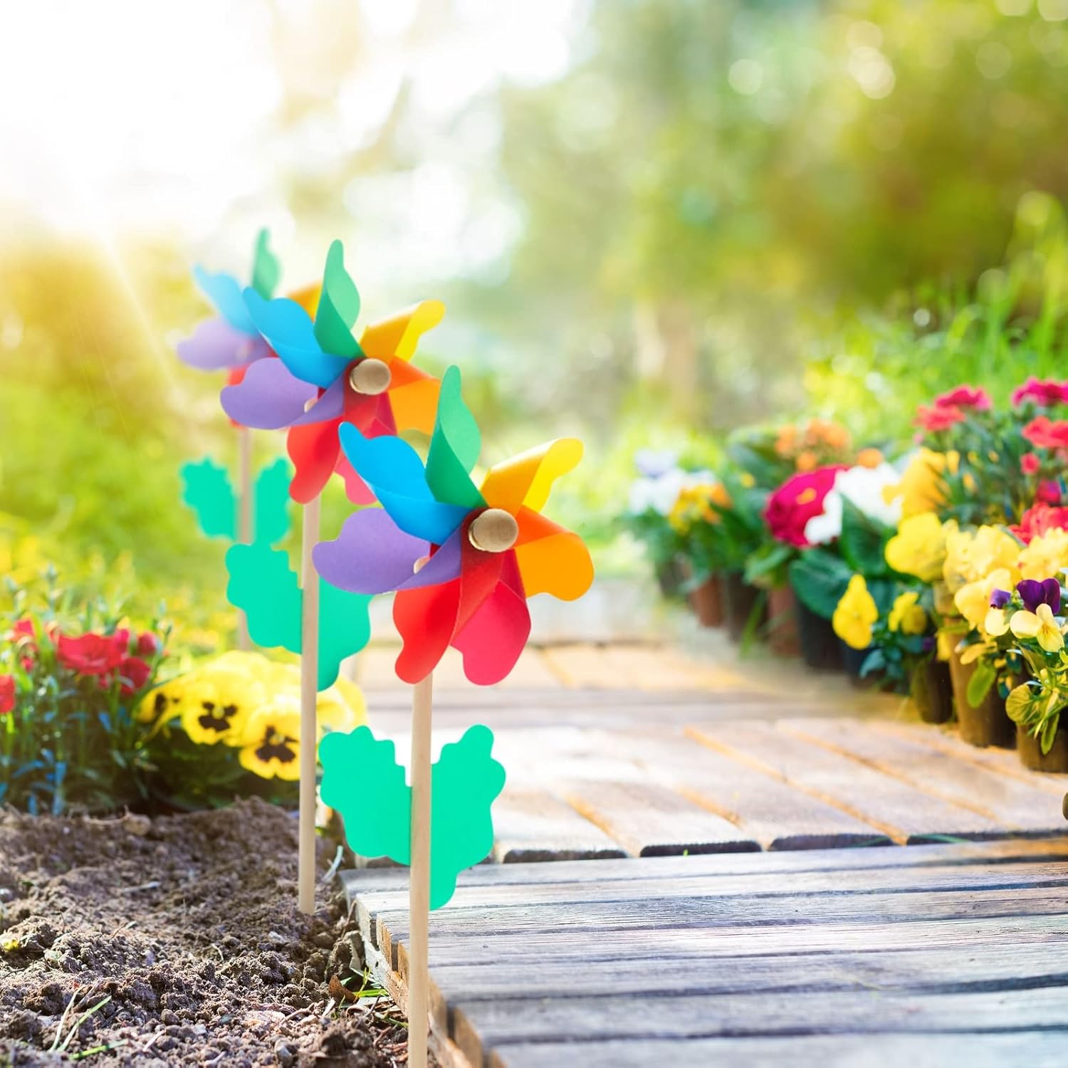 BLUE PANDA Paquete de 12 molinetes de flores arcoíris para patio y jardín, molinillos de viento y recuerdos de fiesta al aire libre para niños,