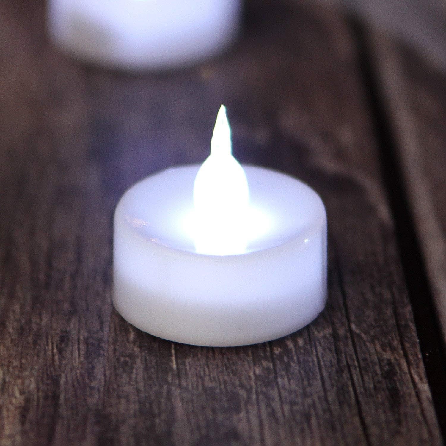 AGPtEK Velas de té, paquete de 24 velas LED sin llama, funciona con pilas, velas sin parpadeo, de larga duración para boda, vacaciones, fiesta,