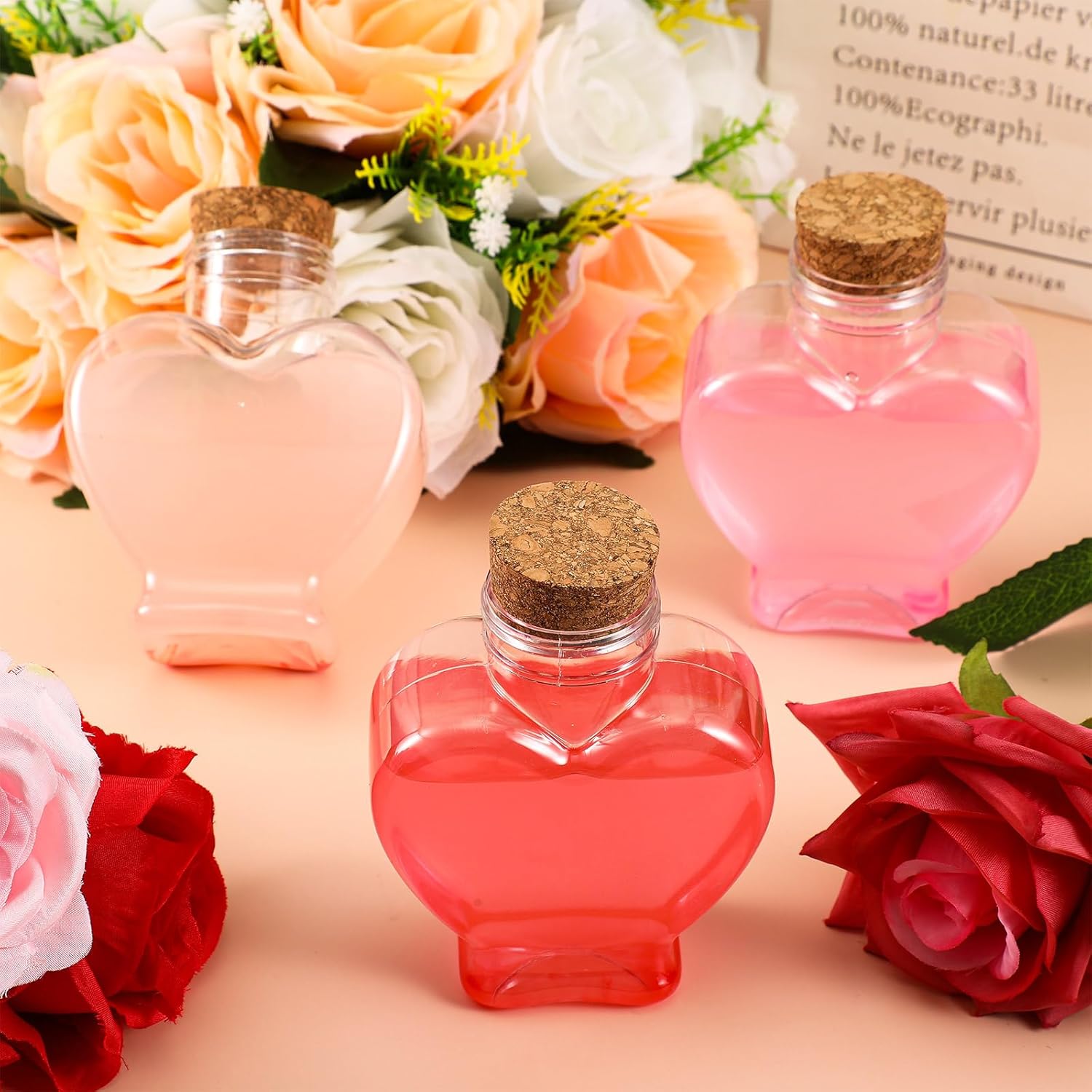 Uiifan 50 frascos de plástico en forma de corazón de 5 onzas con tapas, botellas de arte de arena, pequeñas botellas de plástico transparente para