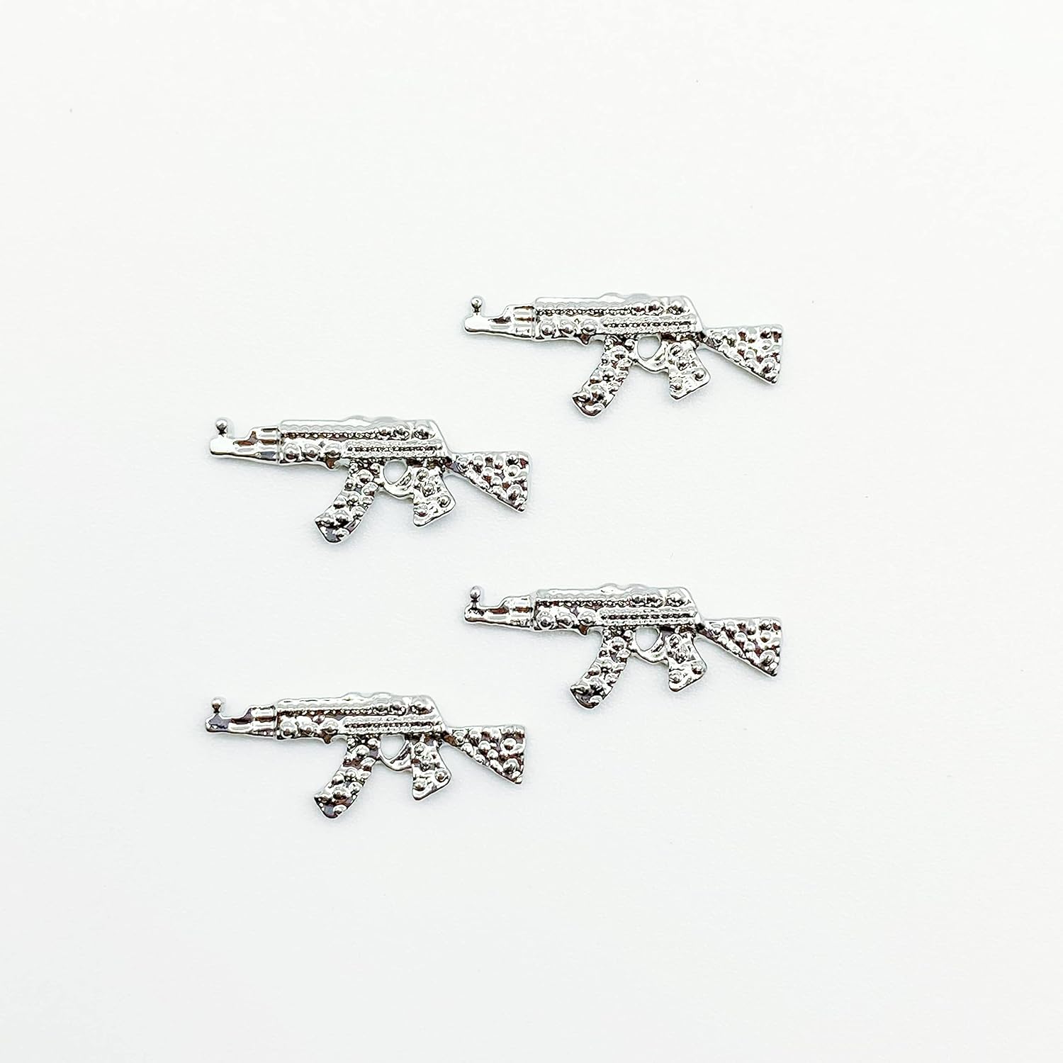 Juego de 40 dijes de aleación 3D para uñas, pistola de metal brillante con diamantes de imitación, dijes de arte de uñas AK para armas, diamantes de
