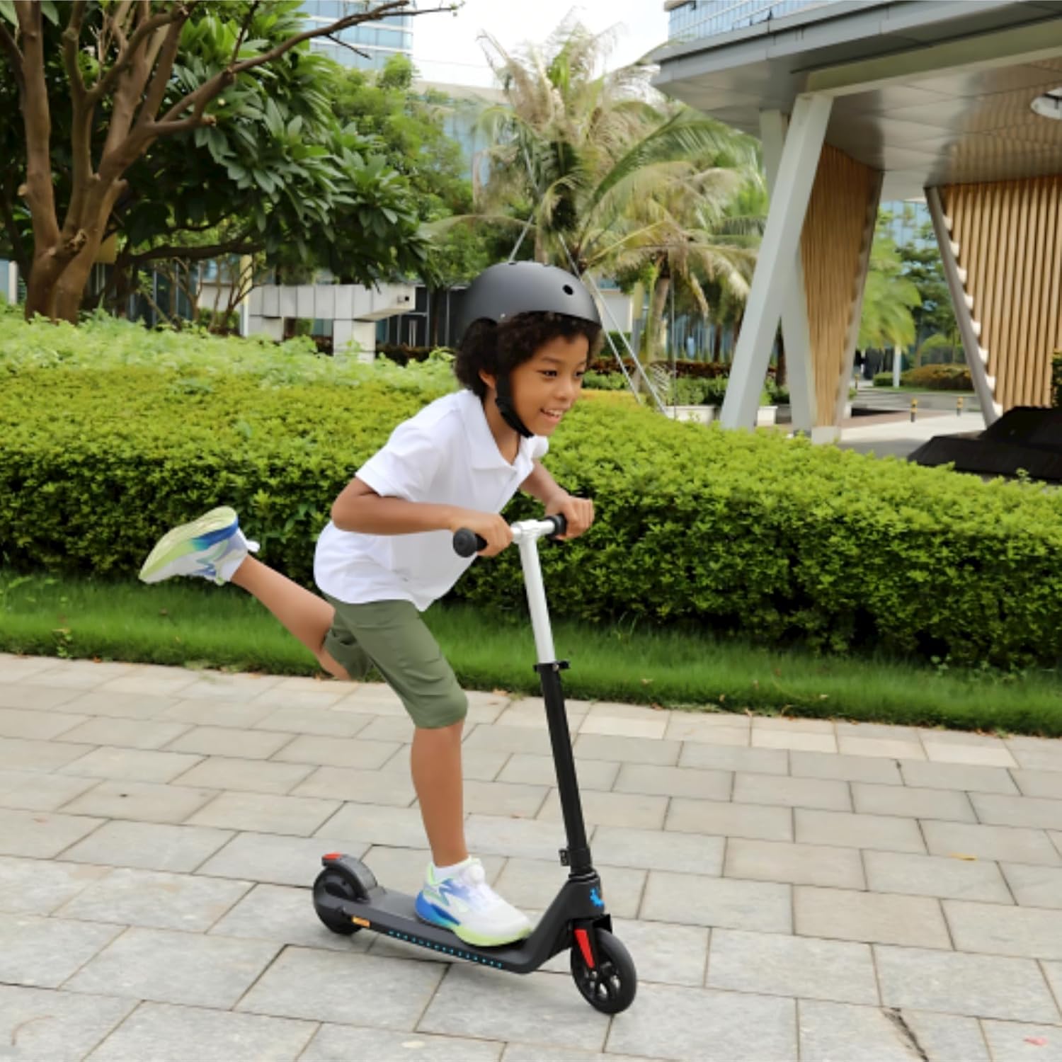 Caroma Scooter eléctrico E32E35 para niños de 6 a 14 años, 10 millas por hora y 7 millas, altura y velocidad ajustables, scooter eléctrico plegable