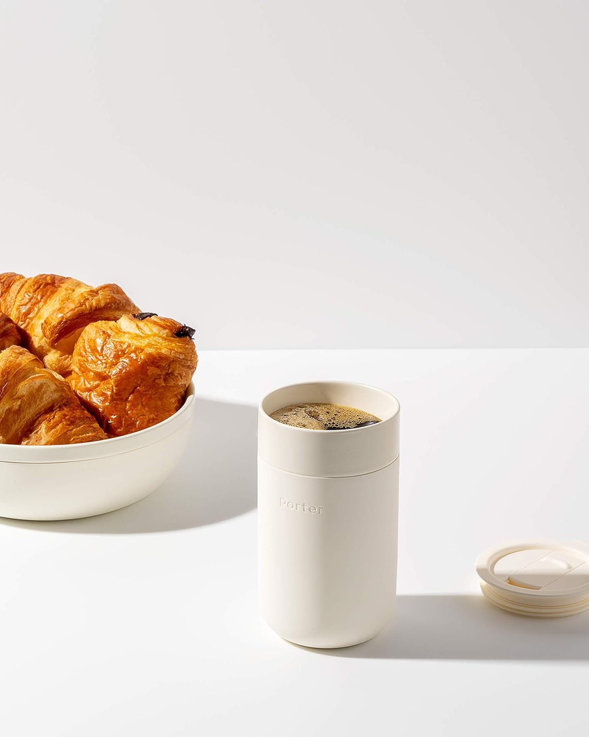 W&P Porter – Taza de cerámica con funda protectora de silicona