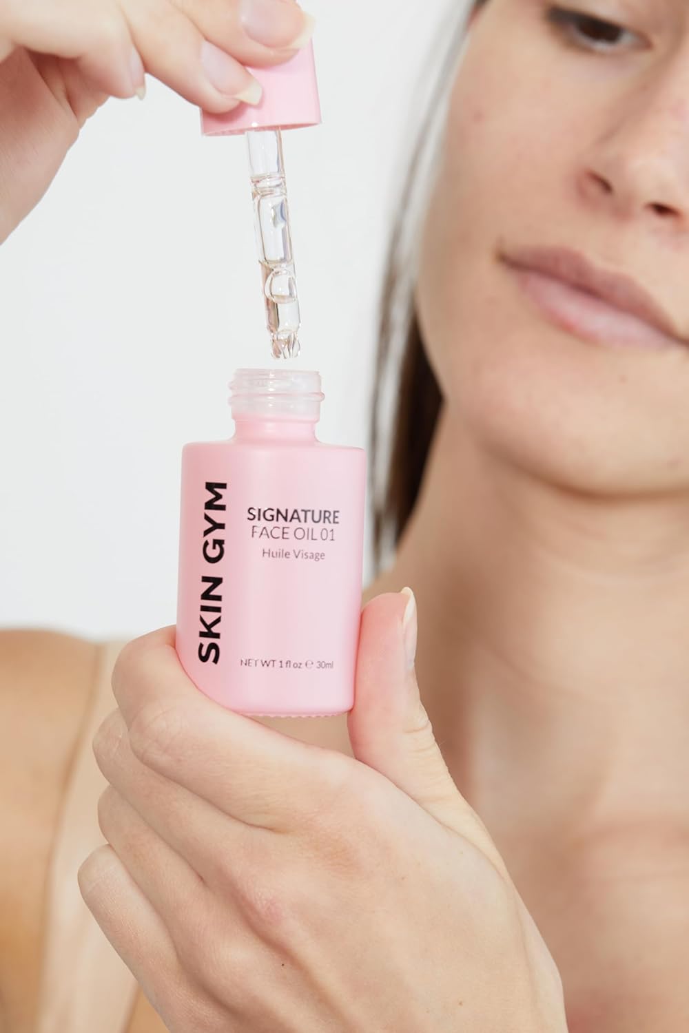 SKIN GYM Aceite facial característico, hidratante y exfoliante – Con vitamina E, jojoba, rosa mosqueta, semilla de albaricoque