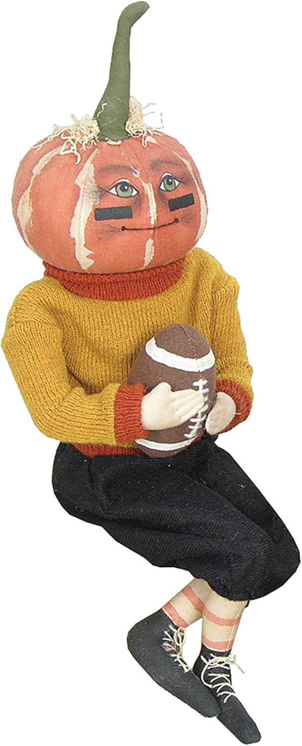 GALLERIE II Football Defense Dan Thanksgiving Pumpkin Harvest Folk Art Doll Collectible, Joe Spencer Tradiciones Reunidas Figuras de decoración para