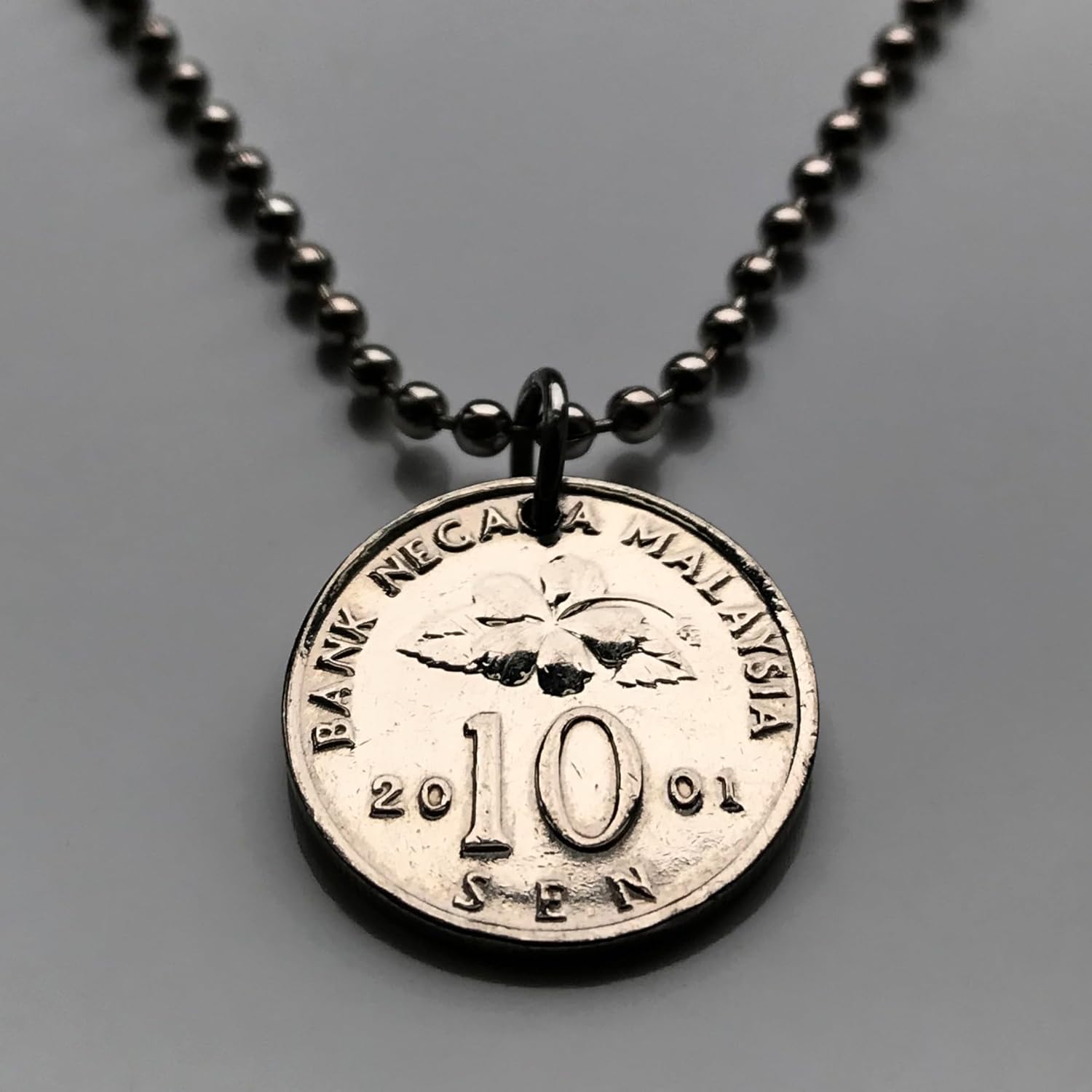 2001 Malaysia 10 Sen coin pendant Malay Congkak game board mancala Hibiscus flower Kuala Lumpur Kajang Seberang Perai Subang Jaya Klang Johor Bahru