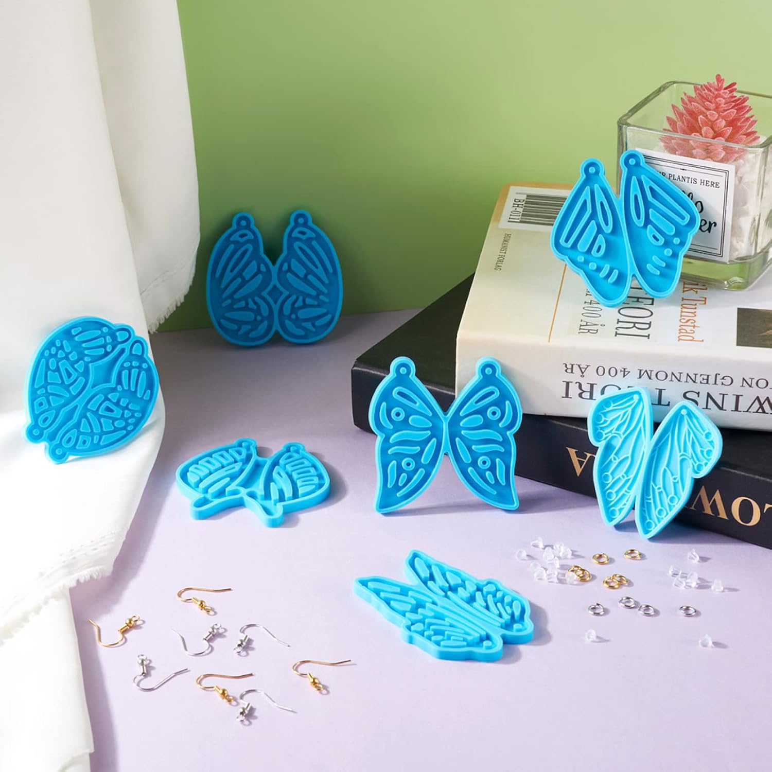 Kit de moldes para aretes de ala de mariposa, 7 piezas, molde de silicona con anillos de salto, ganchos para aretes, tuercas de plástico para aretes
