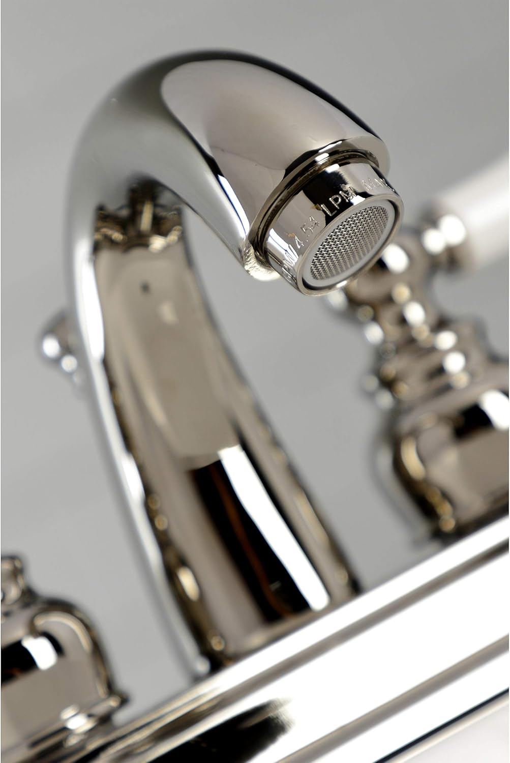 Kingston Brass KB5616PL Restoration – Grifo de baño central de 4 pulgadas, níquel pulido