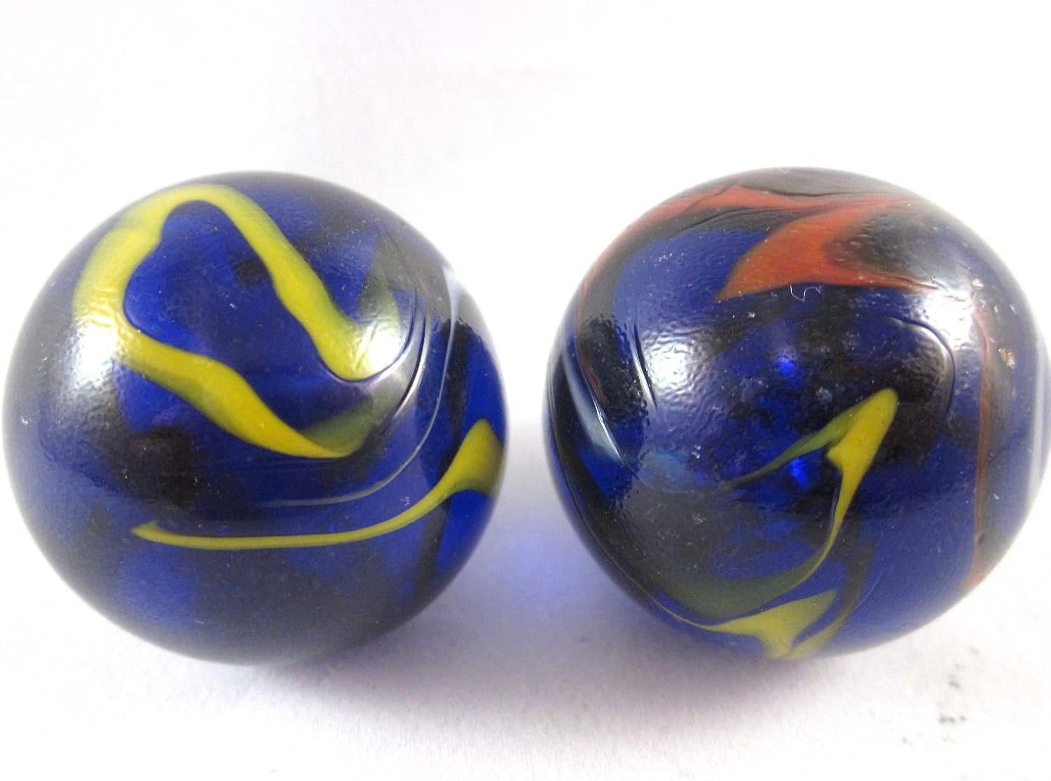 Juego de 2 canicas de cristal macizo de 1.378 in de Michelangelo en forma de remolino grande, color negro, azul, rojo, amarillo, blanco