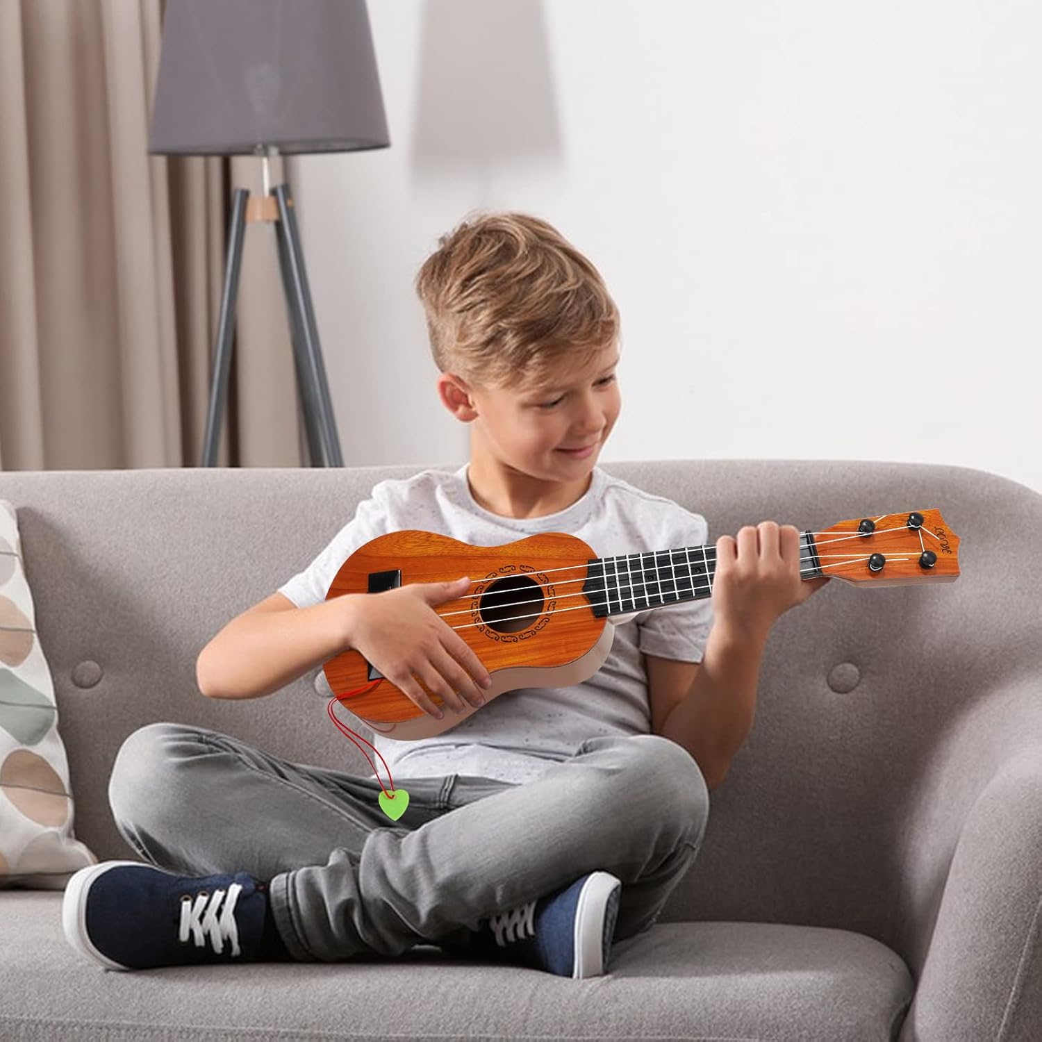 Raimy Guitarra ukelele de 17 pulgadas para niños, 4 cuerdas, mini guitarra para niños, instrumentos musicales, juguetes educativos con púas para