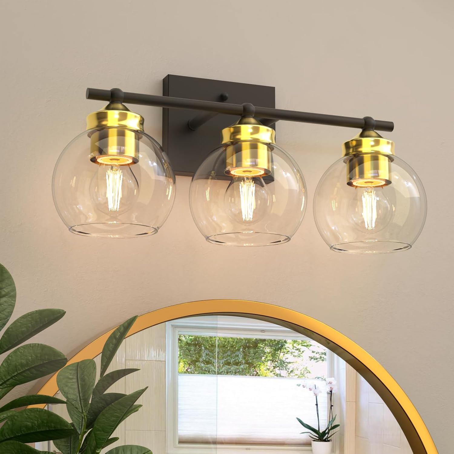 NIORSUN 3 lámparas de baño negras y doradas, lámparas de baño con pantalla de globo de vidrio transparente y base E26, luces de baño sobre espejo,