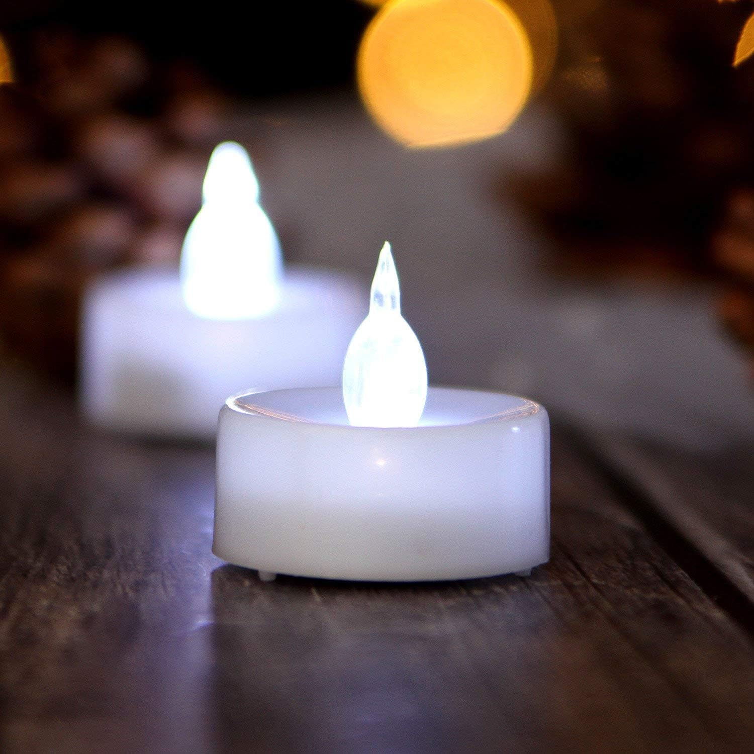 AGPtEK Velas de té, paquete de 24 velas LED sin llama, funciona con pilas, velas sin parpadeo, de larga duración para boda, vacaciones, fiesta,