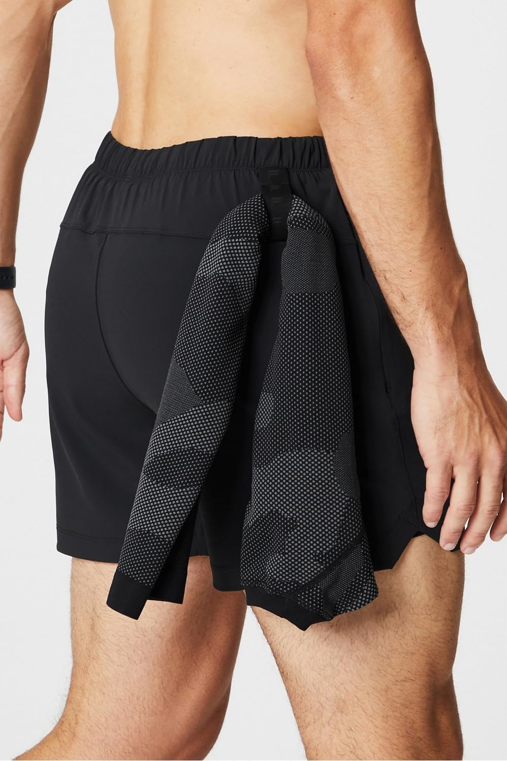 Fabletics Pantalón corto The One para hombre, entrenamiento, natación, ligero, de secado rápido, bolsillo con cremallera, tejido elástico