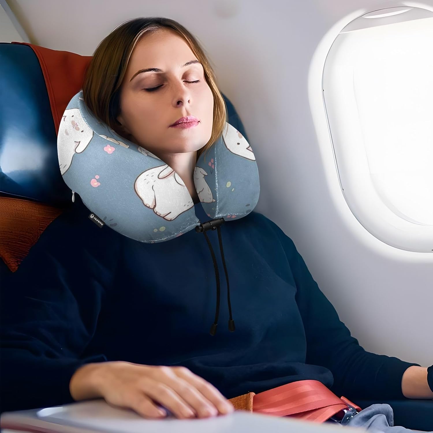 Almohada de cuello de viaje compacta y portátil con patrón de conejo, almohada para avión, con bolsa de almacenamiento con cordón