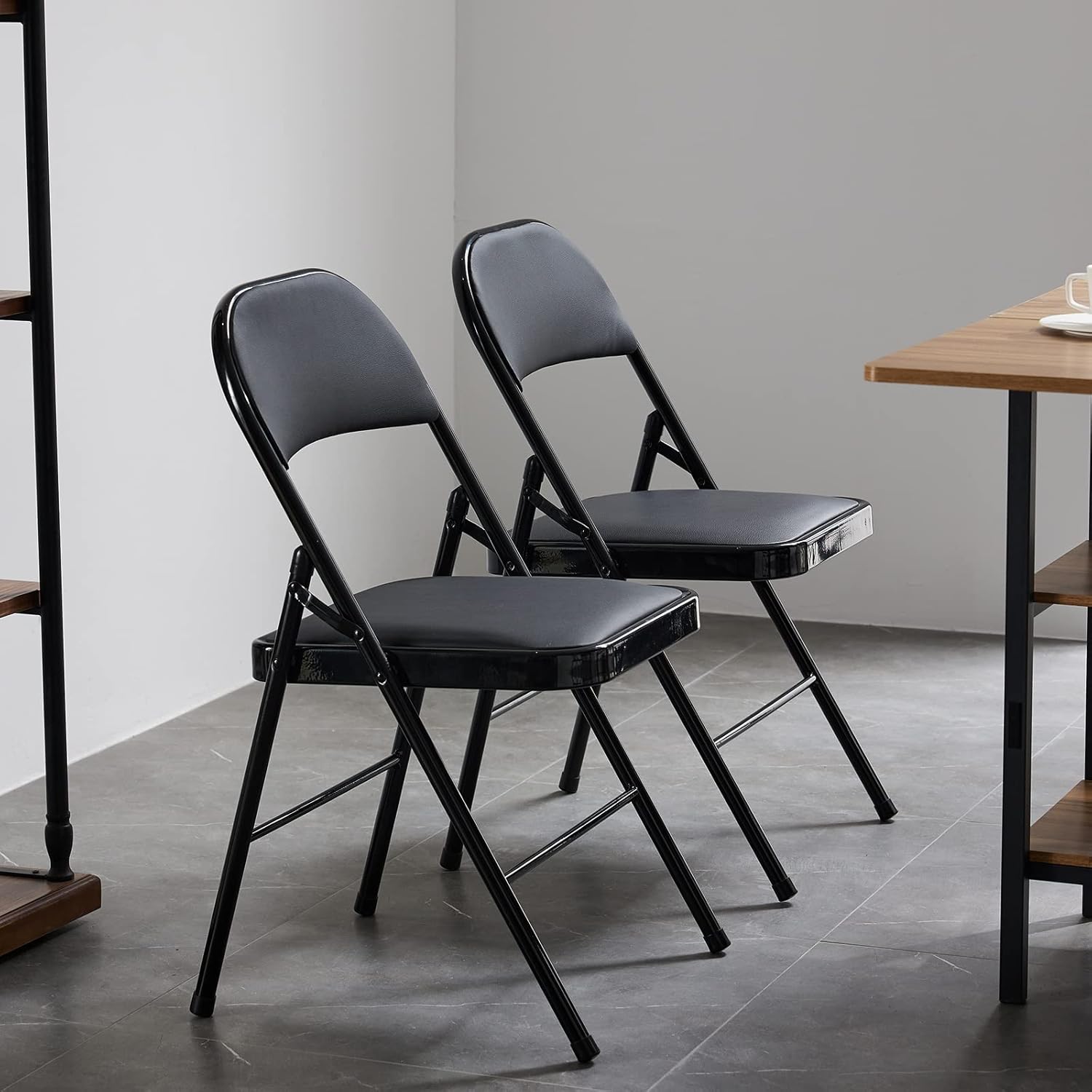 Karl home Paquete de 8 sillas plegables negras con asientos acolchados para exteriores e interiores, asiento comercial apilable portátil con marco