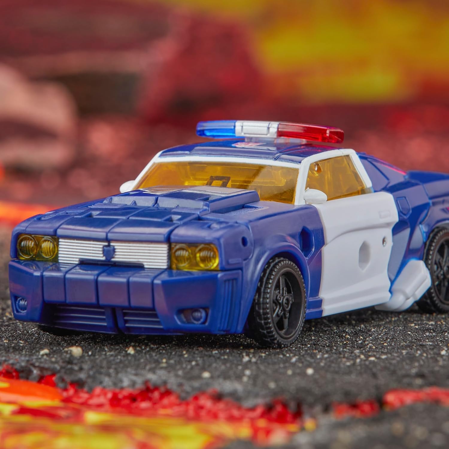 Transformers Legacy United Deluxe Class Rescue Bots Universe Autobot Chase, figura de acción de conversión de 5.5 pulgadas, 8+