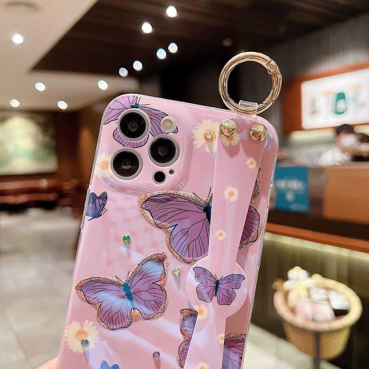 Funda para iPhone 15 Pro Max linda con correa de muñeca con función atril con purpurina de dibujos animados IMD silicona TPU a prueba de golpes