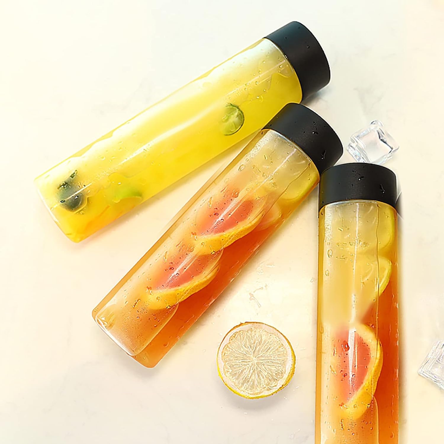 Paquete de 12 botellas redondas de plástico de 16 onzas con tapas, recipientes de jugo con tapas para botella de batidos, botellas de jugo con