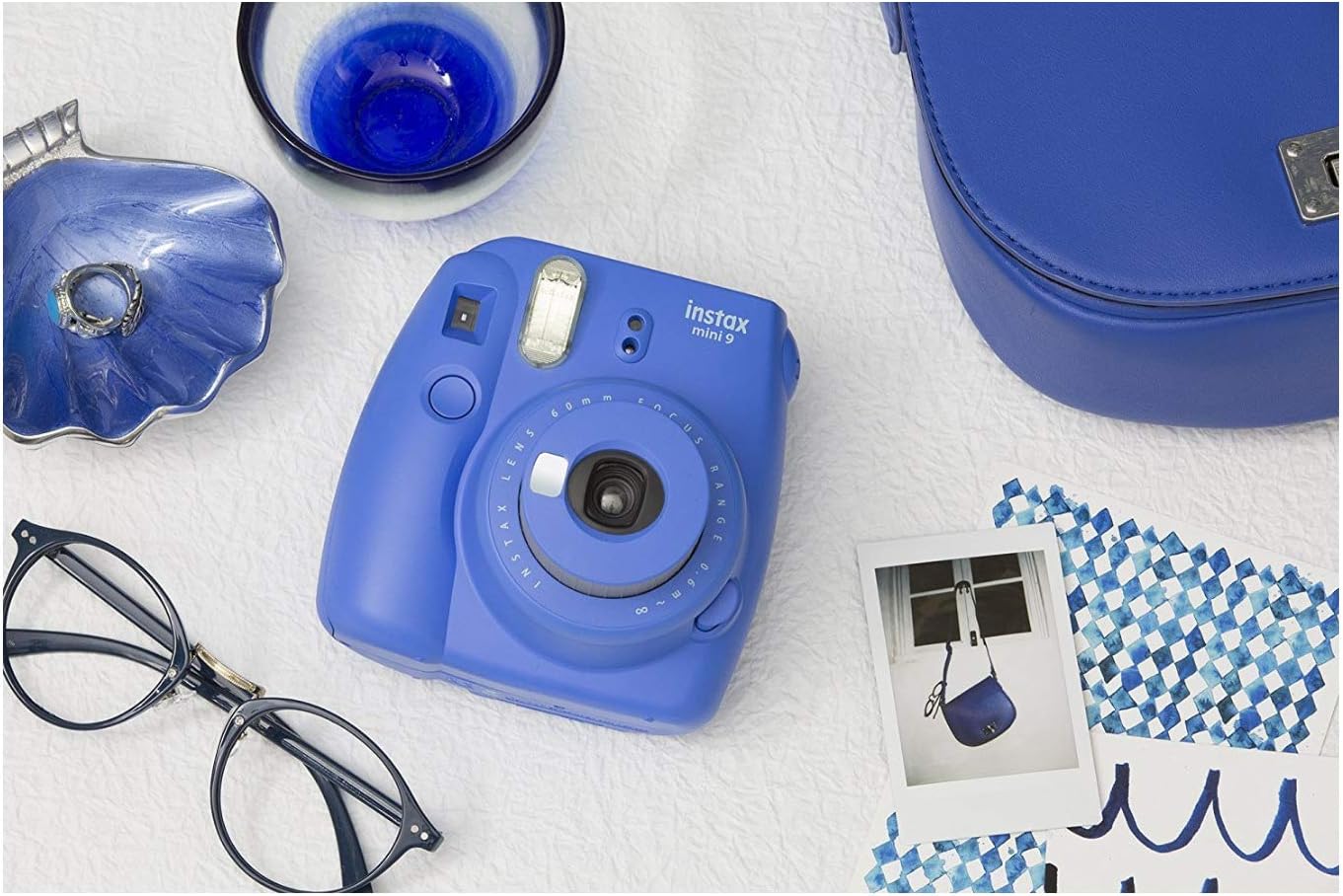 Fujifilm Instax Mini 9  Parent  Cámara instantánea y dos paquetes de hojas fotográficas Fuji-Film INSTAX Mini