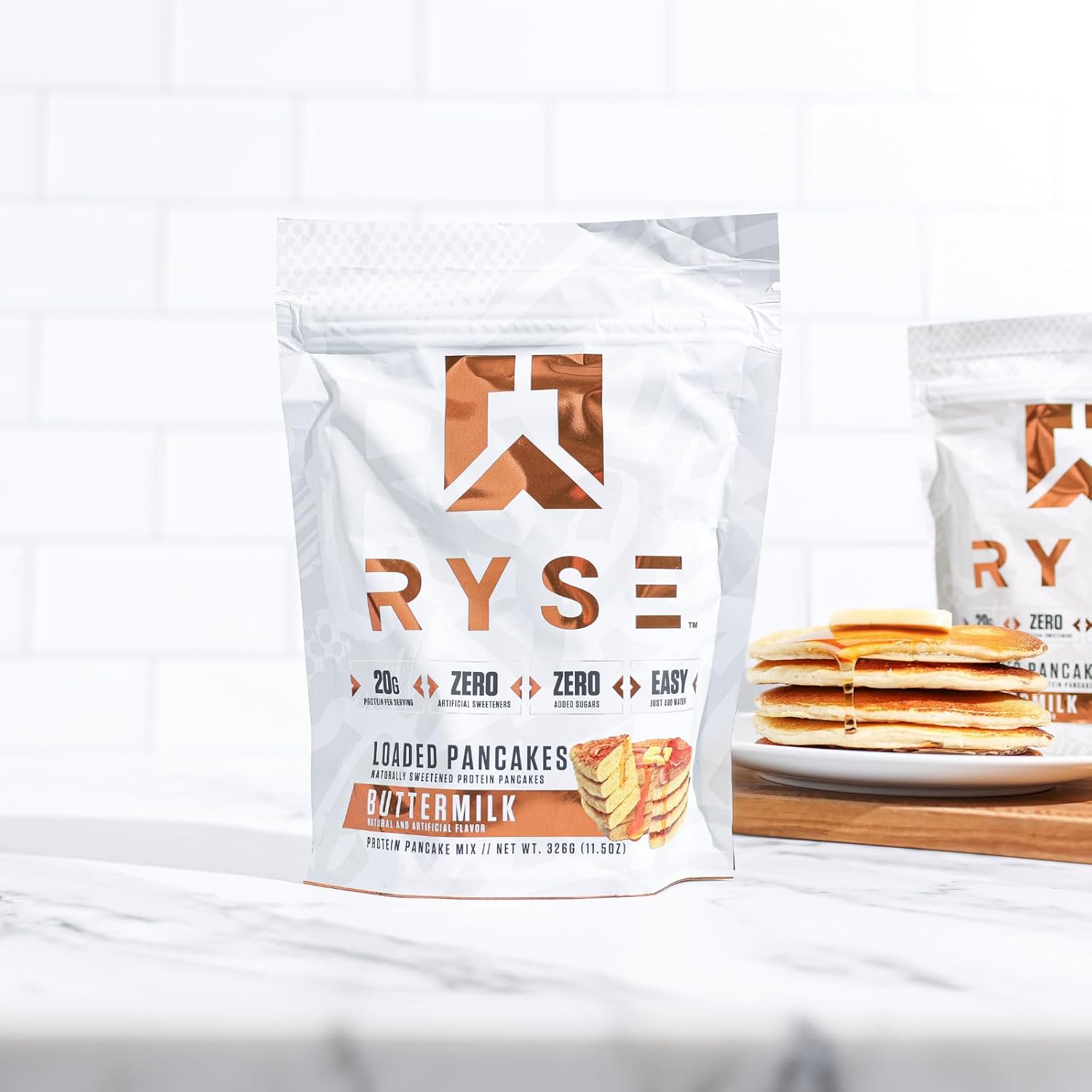 RYSE – Panqueques de proteína cargados  Mezcla de proteínas naturalmente endulzadas para panqueques  cero azúcares añadidos  0.78 onzas de proteína