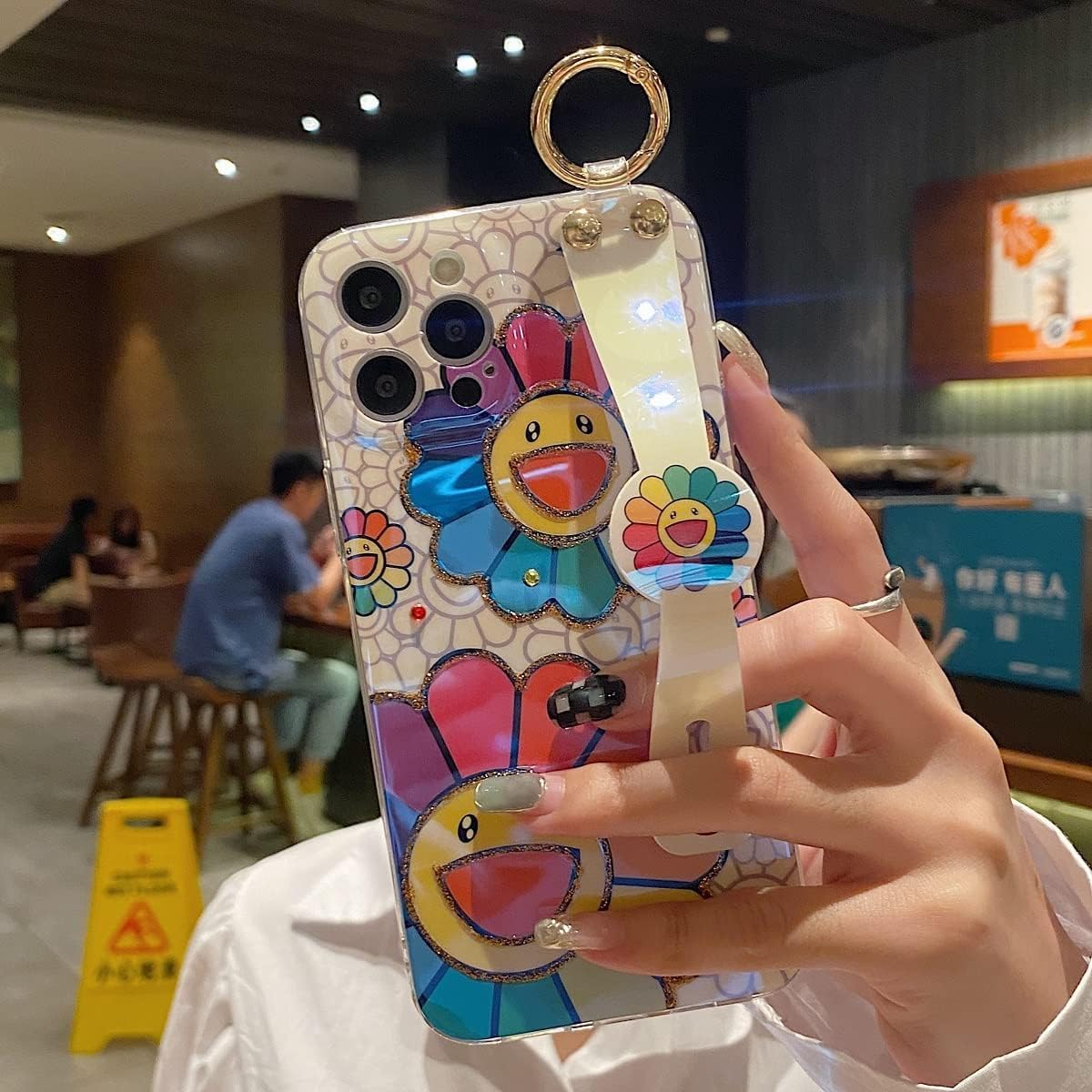 Funda para iPhone 15 Pro linda con correa de muñeca con función atril y purpurina de dibujos animados IMD de silicona TPU a prueba de golpes para