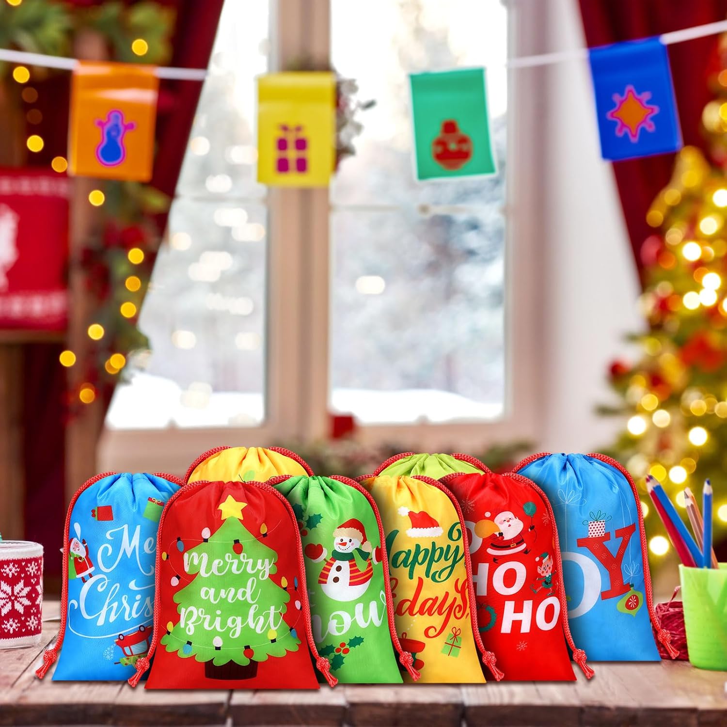 Xuniea 24 bolsas de Navidad con cordón de 10 x 7 pulgadas, bolsas reutilizables de regalo de Feliz Navidad, pequeñas bolsas de envoltura para