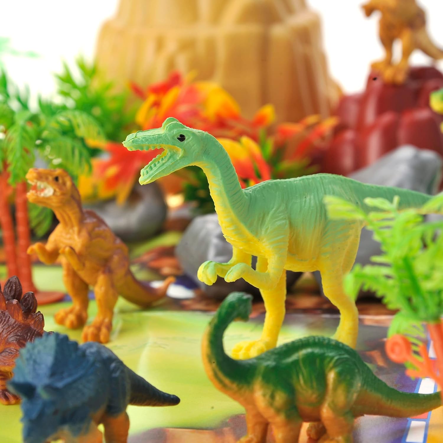 PowerTRC Juego de figuras de dinosaurio con árboles, rocas, tapete de juego y contenedor para niños y niñas  Crea un parque de dinosaurios con un