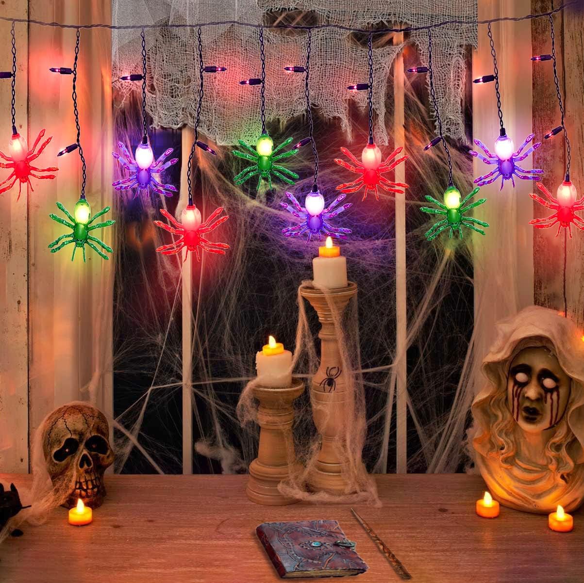 Jasneniebo Luces decorativas de Halloween, 25 bombillas enchufables de 7 pies, tira de luces de Halloween con 10 arañas conectables, cortina de