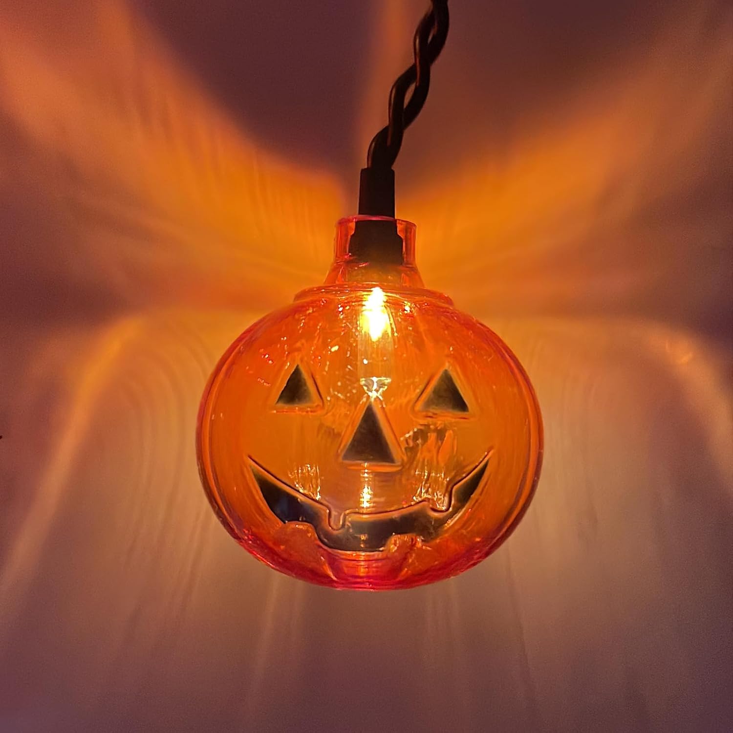 Konictom Cadena de luces de cortina de calabaza, tira de luces de calabaza de 7 pies enchufable con 10 mini calabazas y 25 mini bombillas,