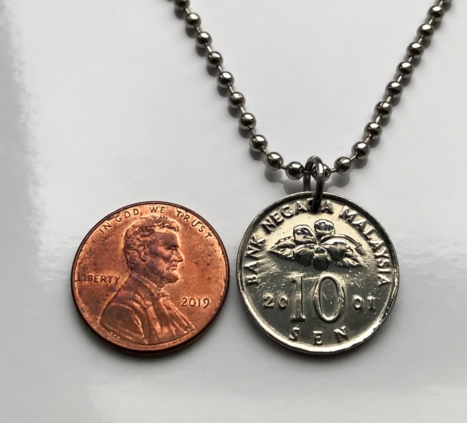 2001 Malaysia 10 Sen coin pendant Malay Congkak game board mancala Hibiscus flower Kuala Lumpur Kajang Seberang Perai Subang Jaya Klang Johor Bahru
