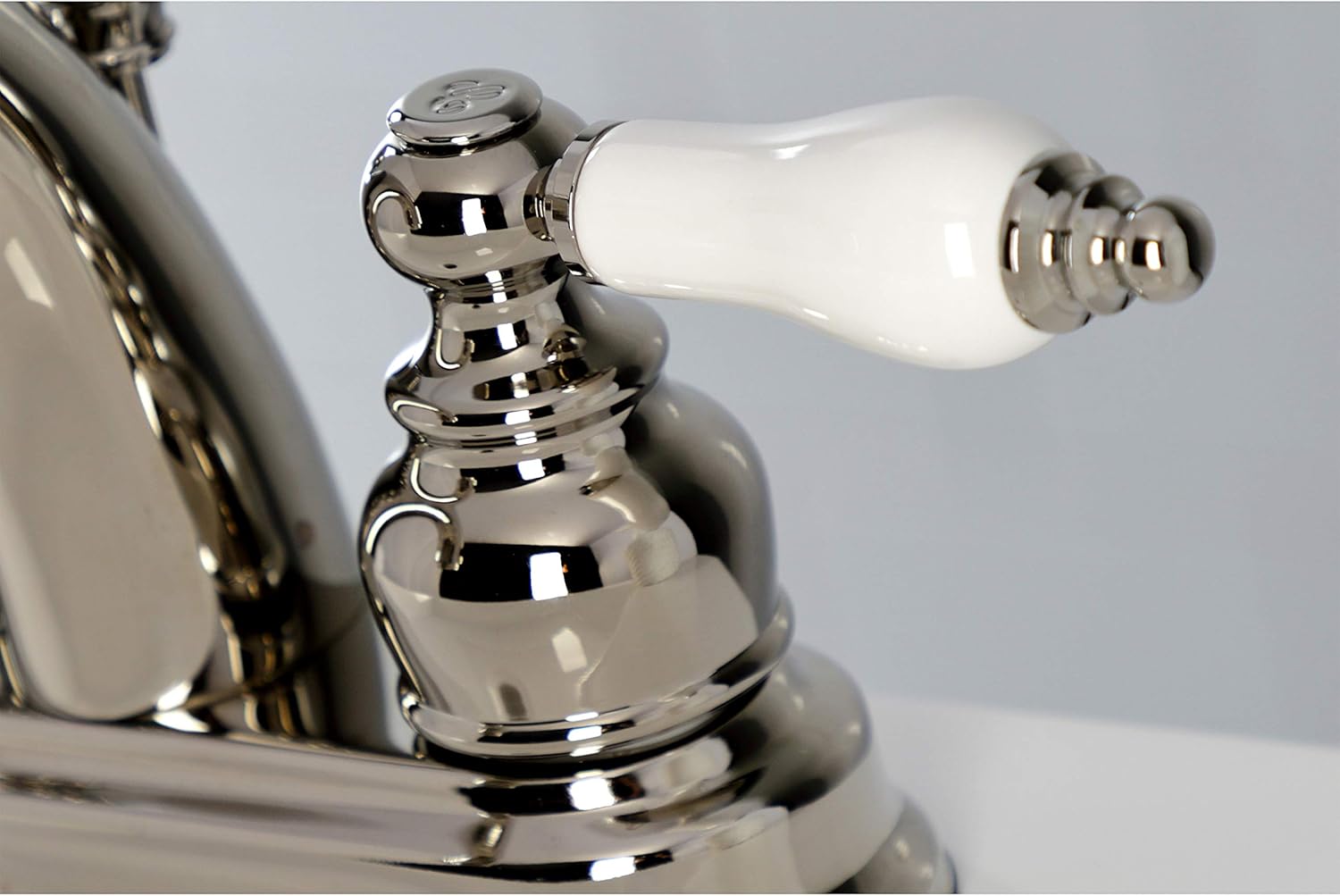 Kingston Brass KB5616PL Restoration – Grifo de baño central de 4 pulgadas, níquel pulido