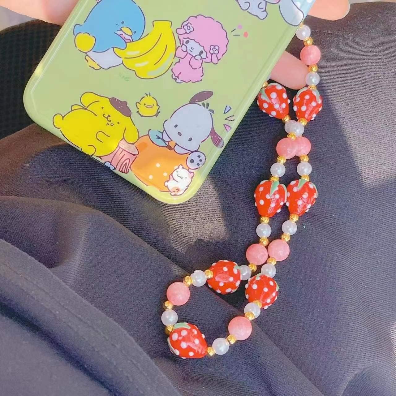 Meefisher 2 piezas de fresa con cuentas para teléfono, cordón de perlas de fruta dulce, correa de muñeca hecha a mano, cuentas antipérdidas,