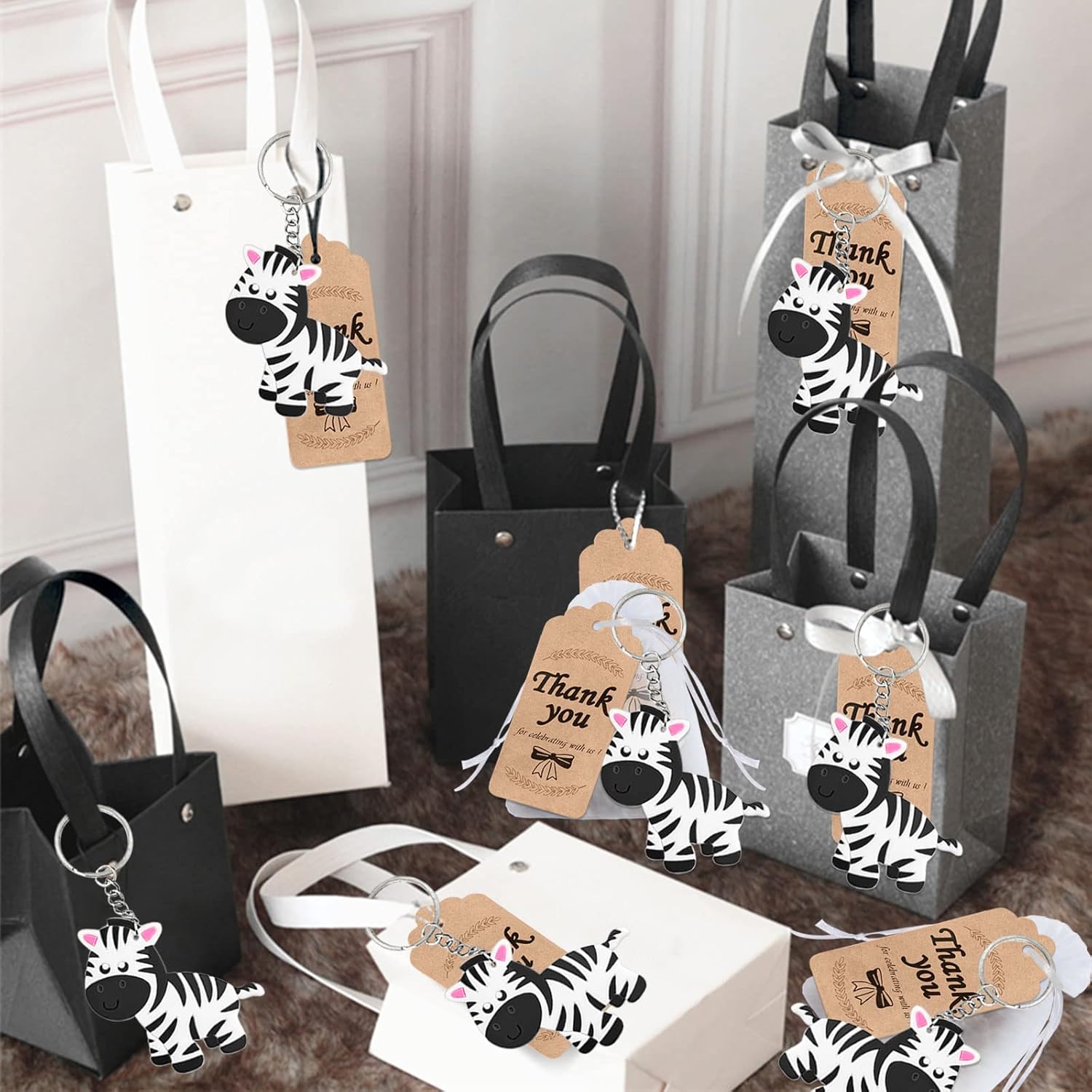 Paquete de 60 regalos de fiesta de cebra que incluye 20 llaveros, 20 etiquetas de agradecimiento, 20 bolsas de regalo para llavero de cebra, regalo