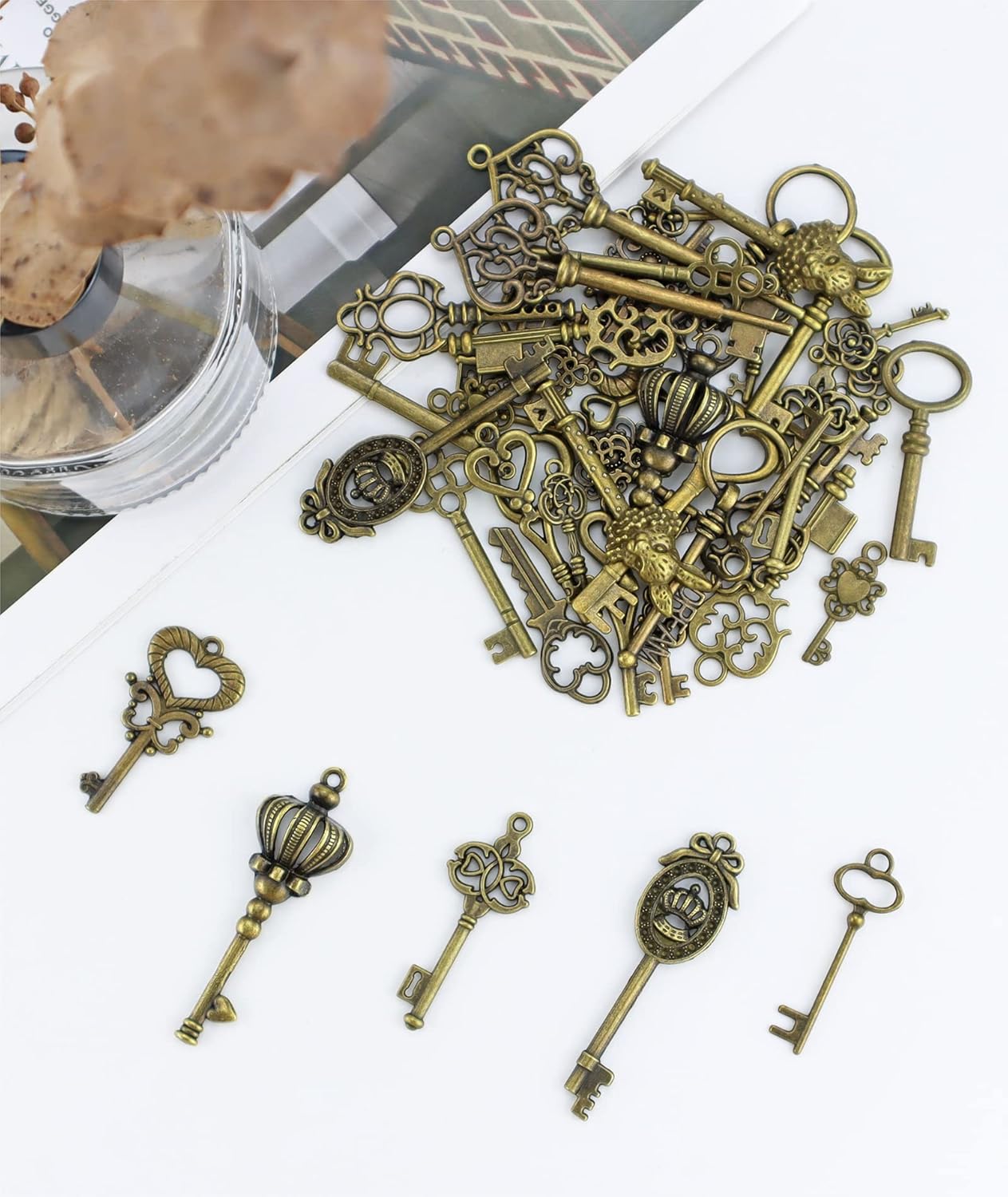 JIALEEY Dijes para llaves de esqueleto vintage, 23 tipos de 46 dijes de bronce antiguo para collares, colgantes, suministros de fabricación de