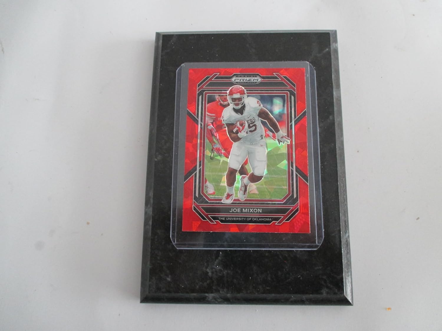 JOE MIXON THE UNIVERSITY OF OKLAHOMA 2023 PRIZM RED ICE DRAFT PICKS PLAYER CARD MOUNTED ON A 4″ X 6″ BLACK MARBLE PLAQUE