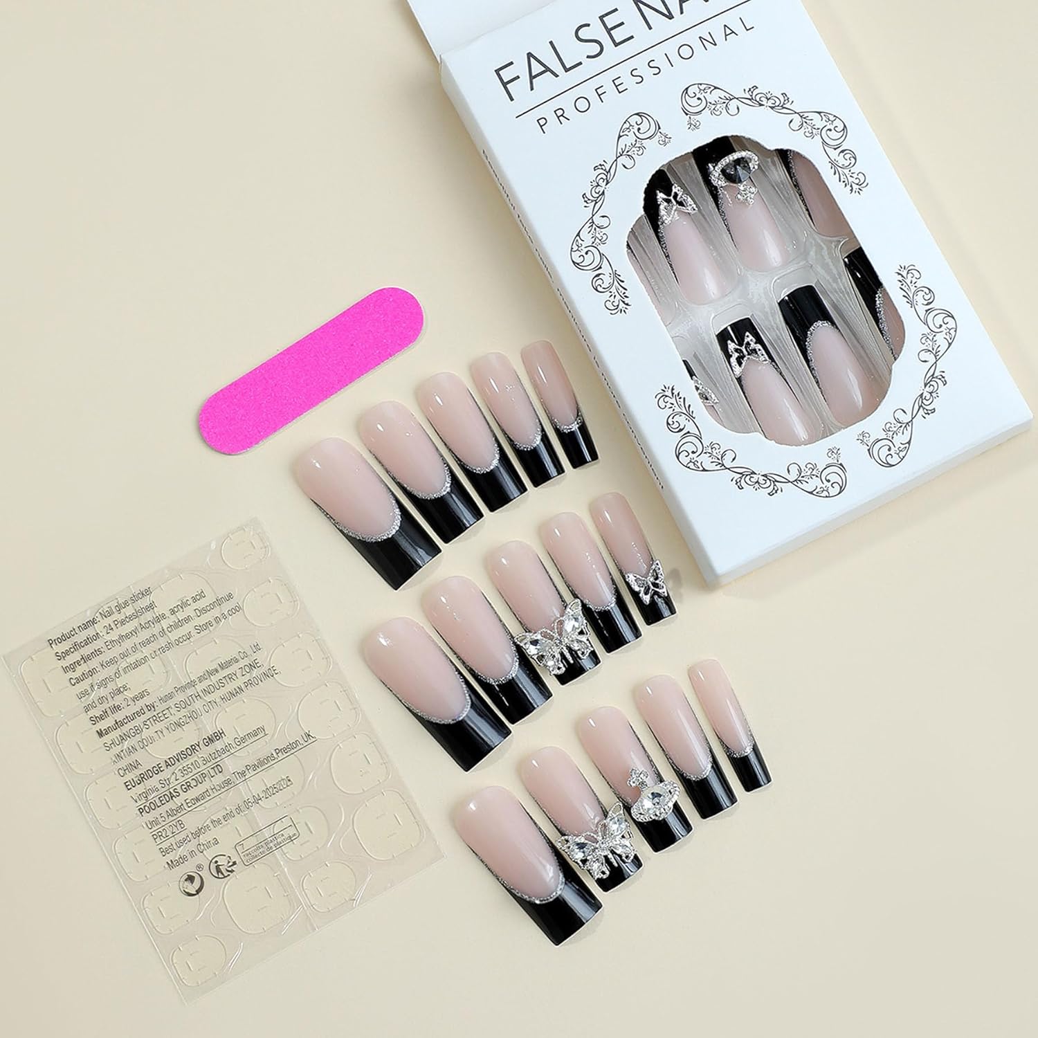 Uñas largas a presión con punta francesa, uñas postizas con dije de diamantes de imitación, uñas largas con diseños de mariposa y planetas, uñas