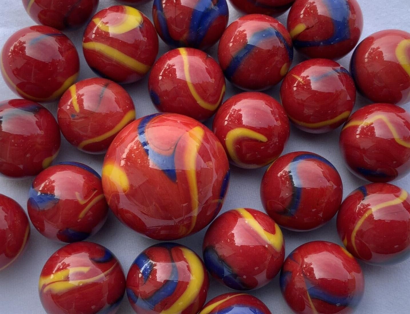 25 canicas de vidrio guacamayo escarlata rojoazulamarillo Superman estilo clásico paquete de juego (24 jugadores, 1 tirador) decoraciónrelleno de