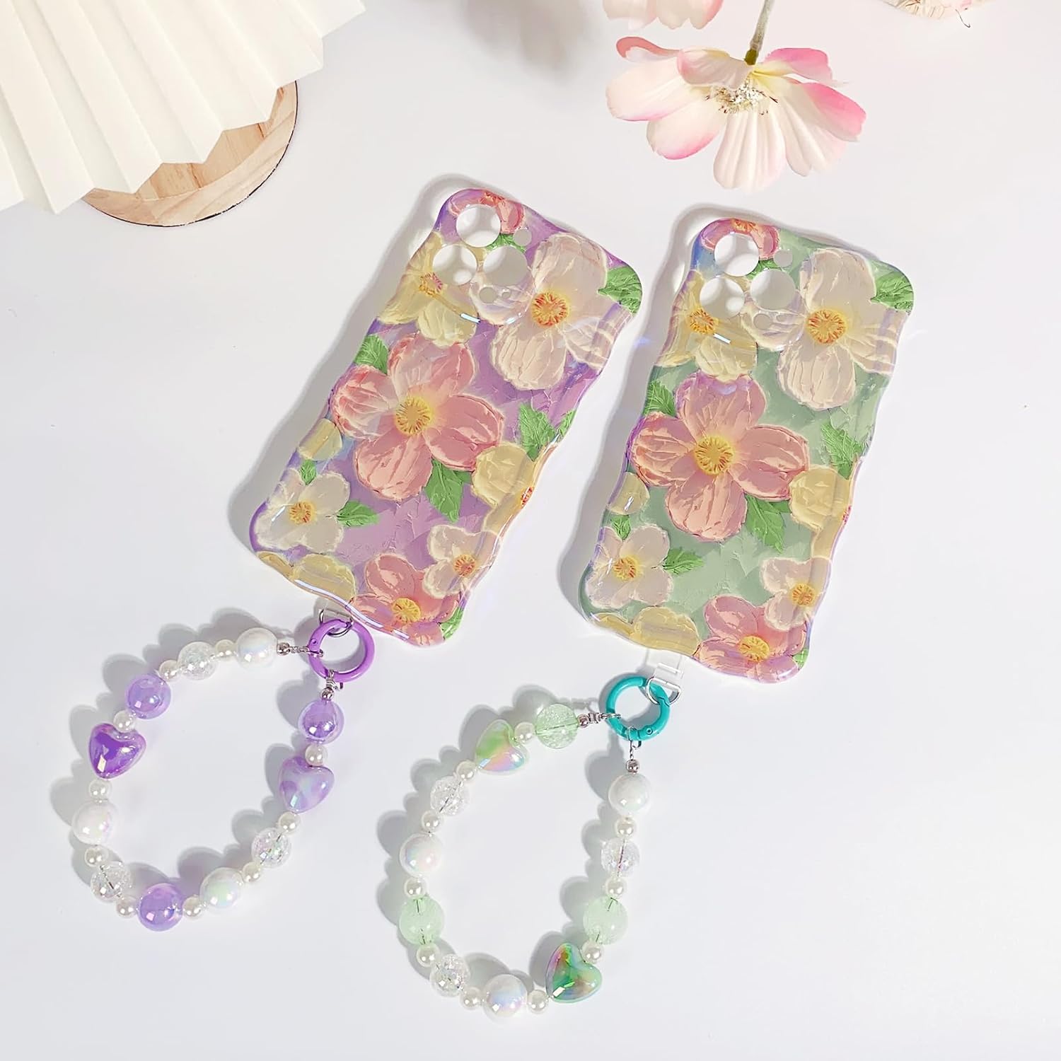 NITITOP Funda compatible con iPhone 13 Pro Max, bonita funda de pulsera con flores de aceite y correa de muñeca con cordón verde para mujeres y