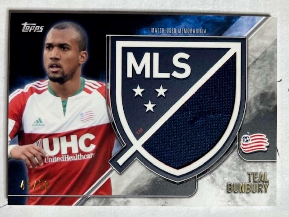 2015 Topps APEX MLS Crest Jumbo Relics #CJR-TB Teal Bunbury JerseyRelic New England Revolution Official Major League Soccer Card in Raw (NM or