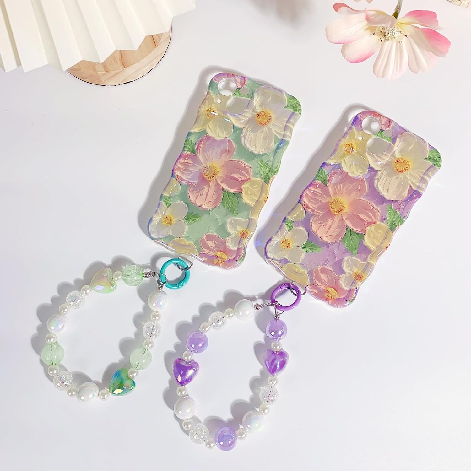 NITITOP Funda compatible con iPhone 13, bonita funda de pulsera de flores de aceite moradas con bonita correa de muñeca con cordón de flores para