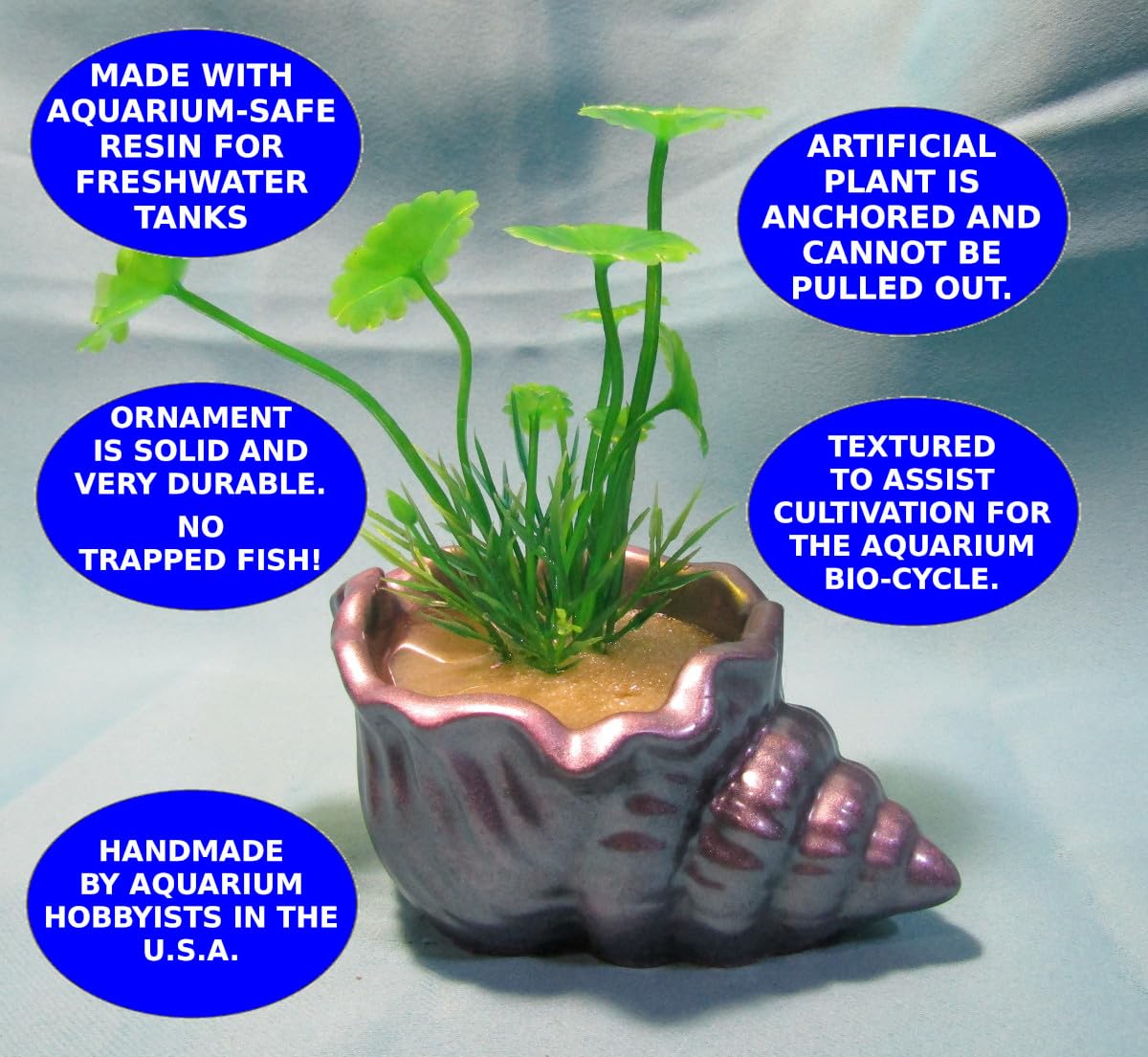 Aquarium Decoration – Mauve and silver shell with green artificial plant. Unique, heavy,and durable solid fish tank ornament. Made in the USA.