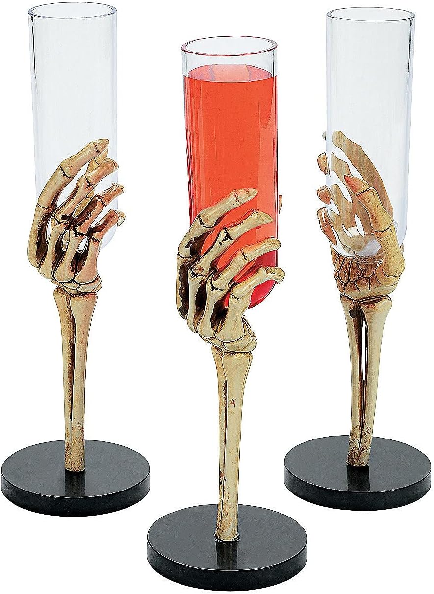 Fun Express Juego de 12 vasos de flauta de mano de esqueleto, capacidad para 2 onzas, plástico sin BPA, decoraciones de fiesta de Halloween