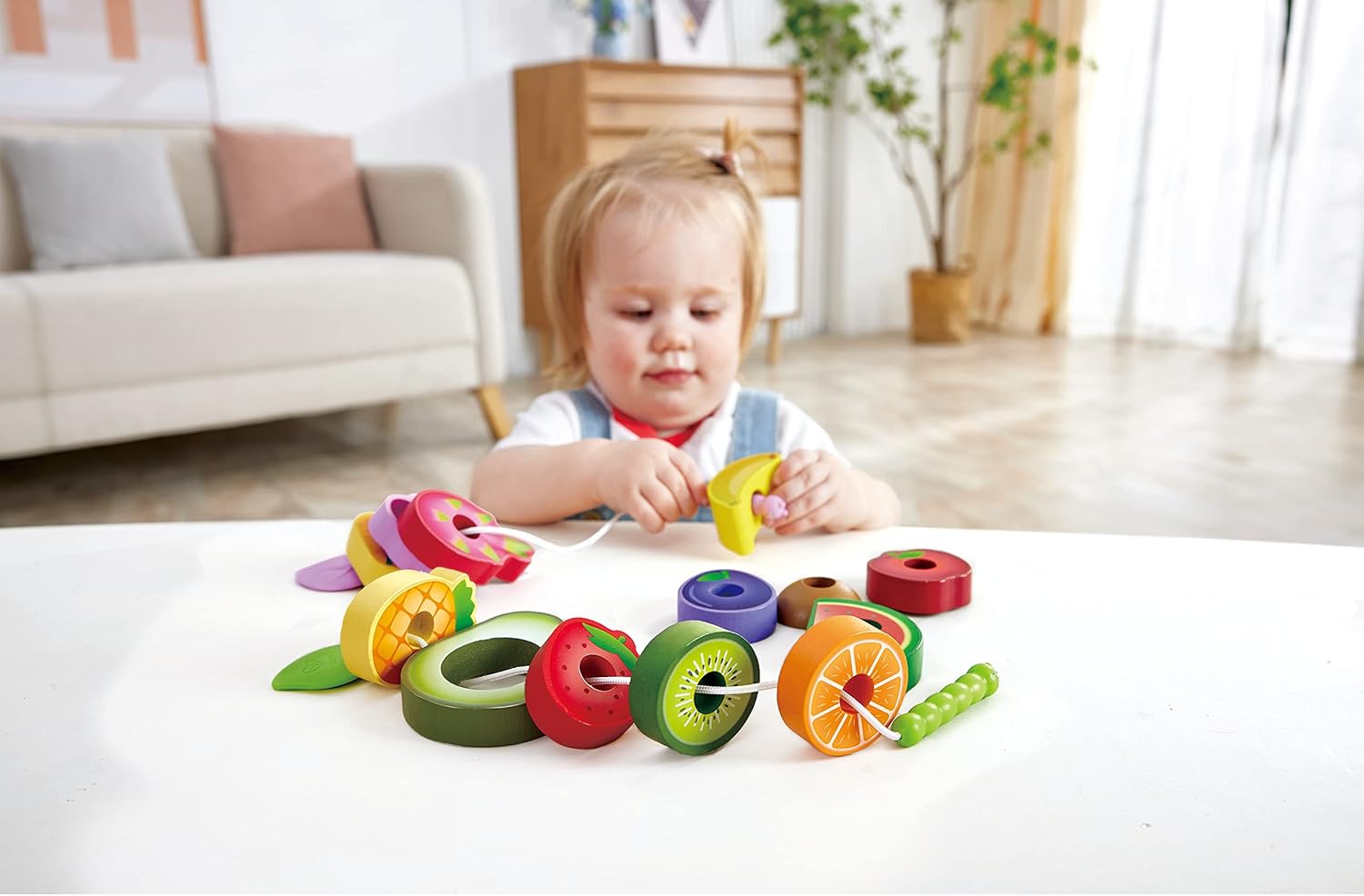 Hape Juego de fiesta de frutas de oruga