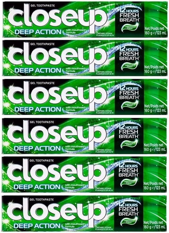Close up Pasta de dientes de acción profunda fresca mentol 5.64 oz.