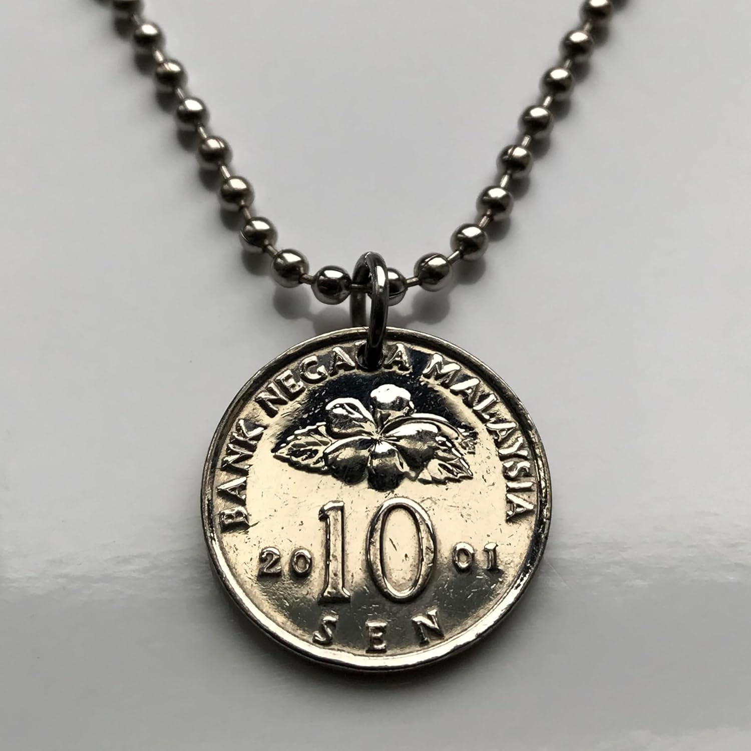 2001 Malaysia 10 Sen coin pendant Malay Congkak game board mancala Hibiscus flower Kuala Lumpur Kajang Seberang Perai Subang Jaya Klang Johor Bahru