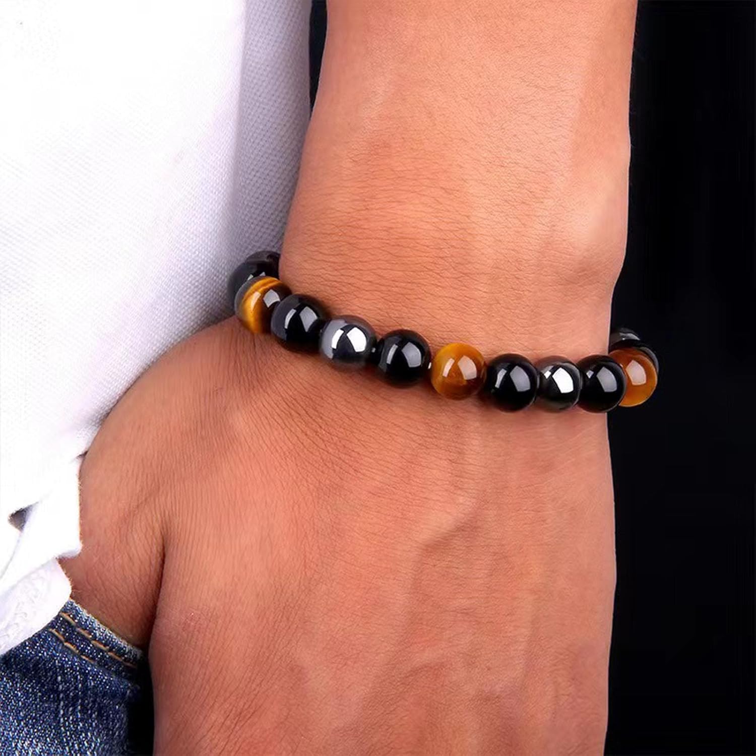 triple protection bracelet tigers eye,hematite, obsidianA handmade beaded crystal healing bracelet that can bring luck, happiness and protection.
