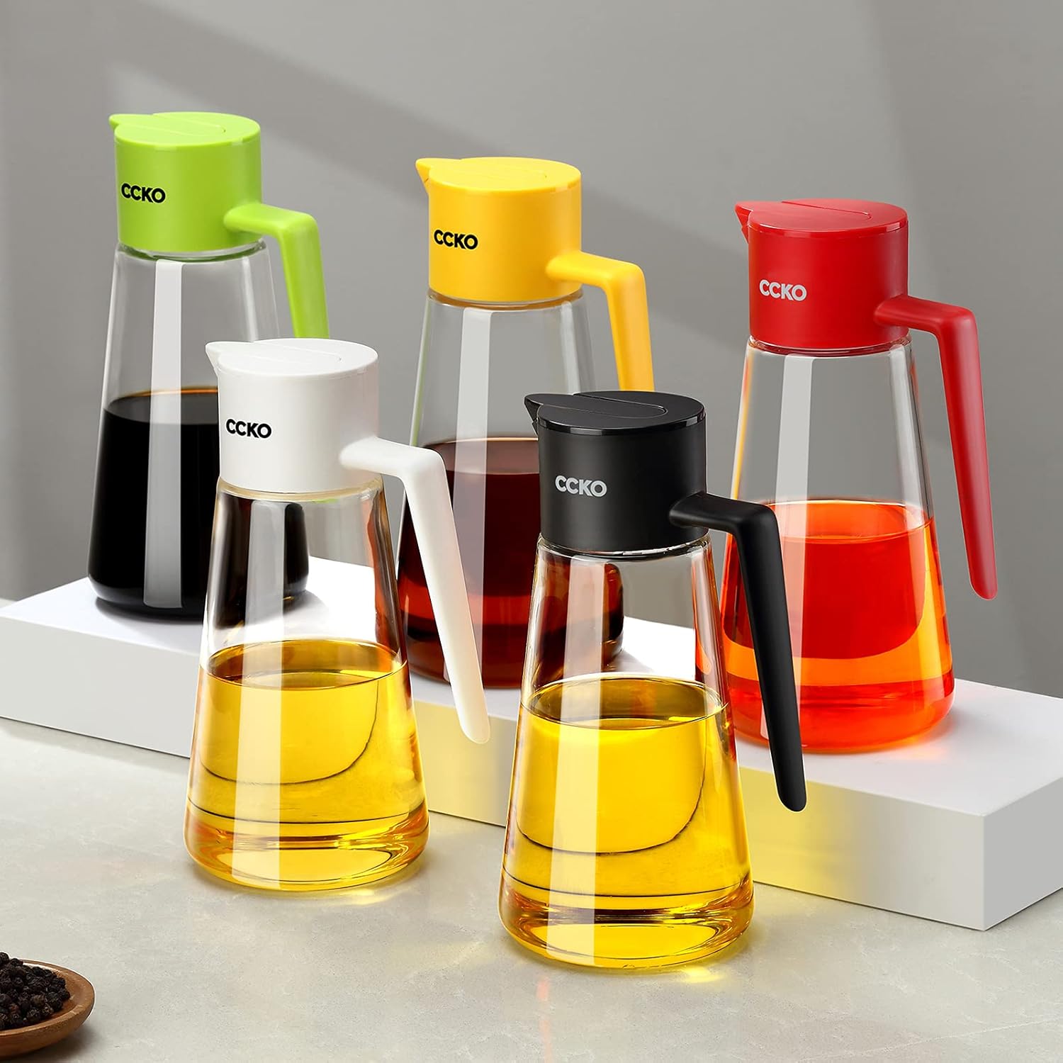 CCKO Botella dispensadora de aceite de oliva de 19 onzas para cocinar en la cocina, dispensador automático de aceite de cocina sin goteo, adecuado
