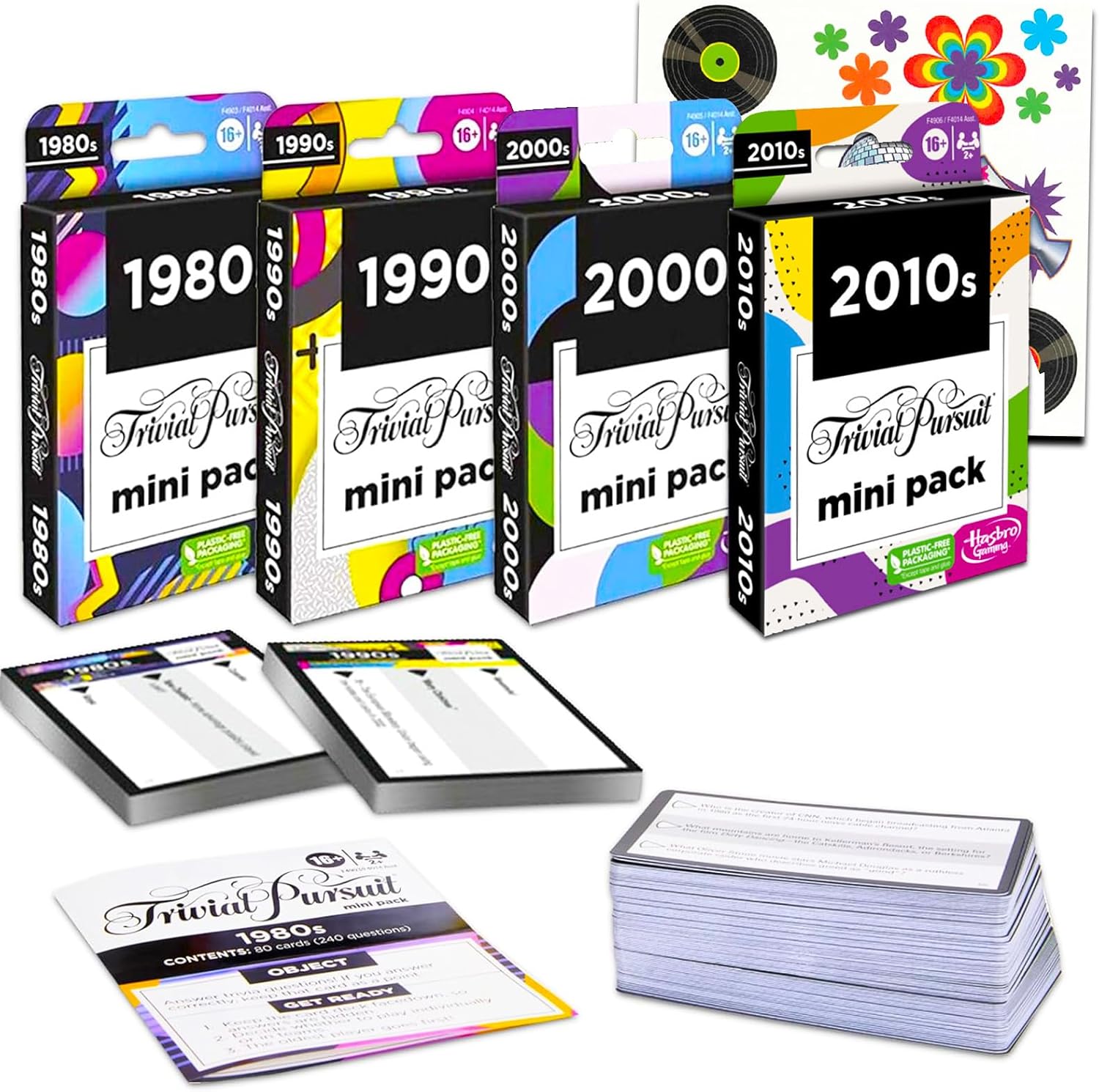 Trivial Pursuit – Paquete de 4 tarjetas de juego  Paquete con 4 mini paquetes Trivial Pursuit con tatuajes de los años 80  2010  Mini paquetes de