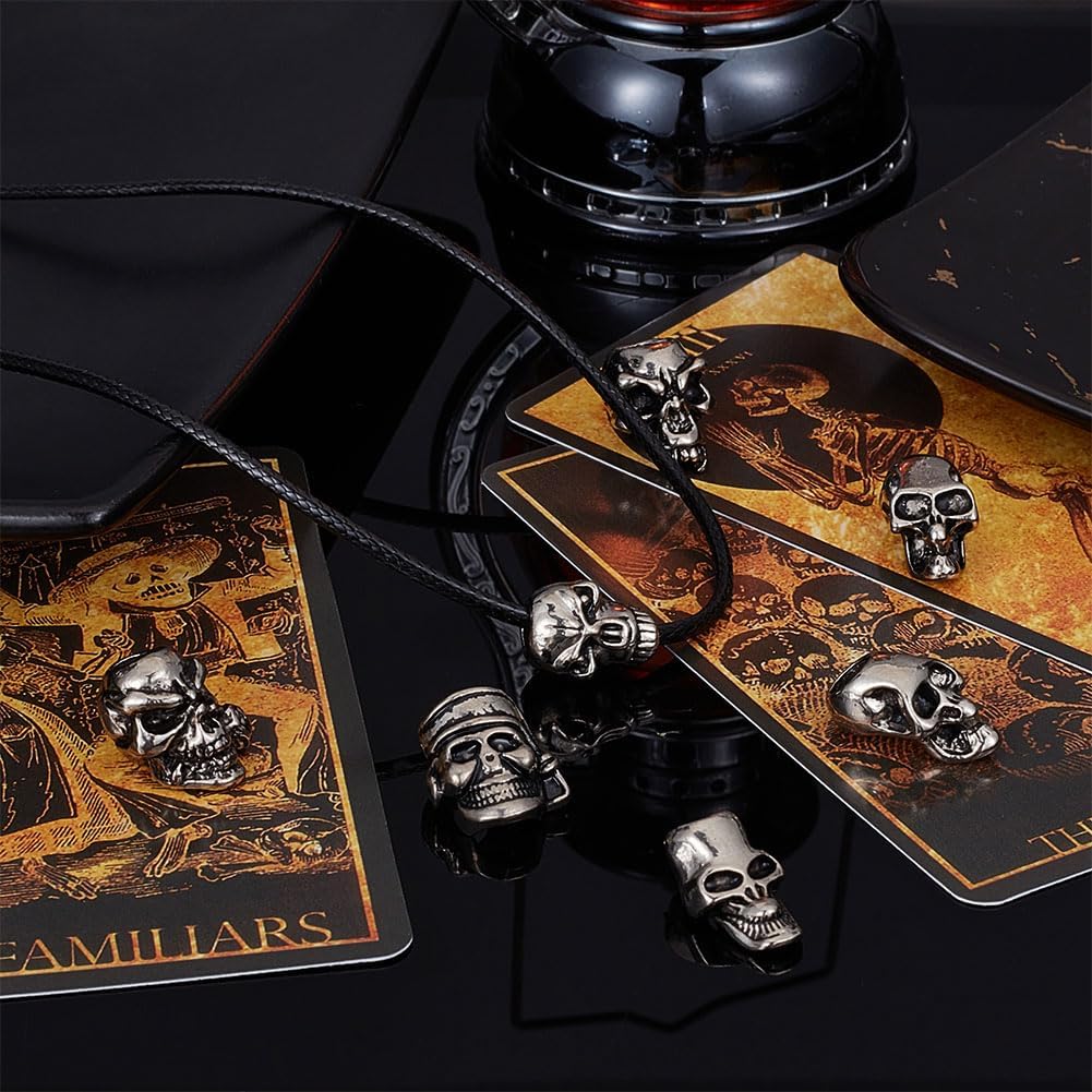 UNICRAFTALE 16cs 8 estilos de aleación de plata antigua calavera cuentas al aire libre EDC herramienta paracaídas cuerda calavera cuentas retro