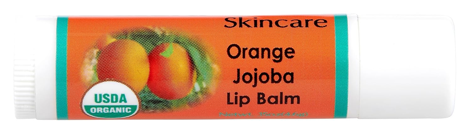 Paquete de 2 bálsamos labiales orgánicos de naranja con más del 70% de aceite de jojoba. 100% natural con cera de abejas. Hidratante naturalmente.